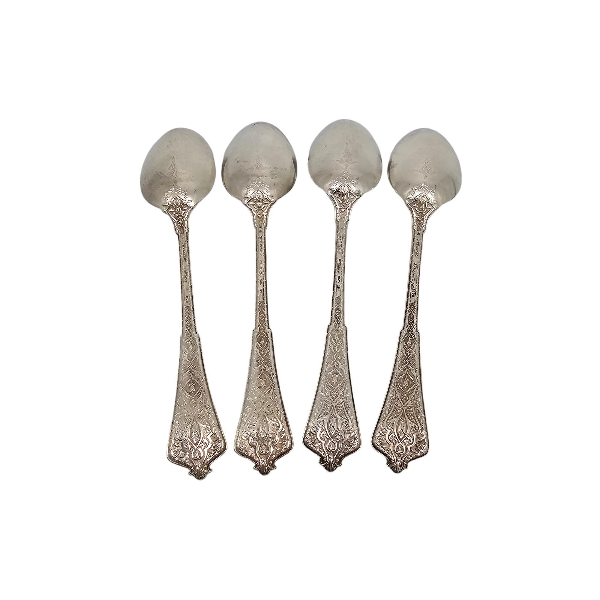 Set of 4 sterling silver teaspoons in the Persian pattern by Tiffany & Co with multiple monograms.

Monograms appears to be 