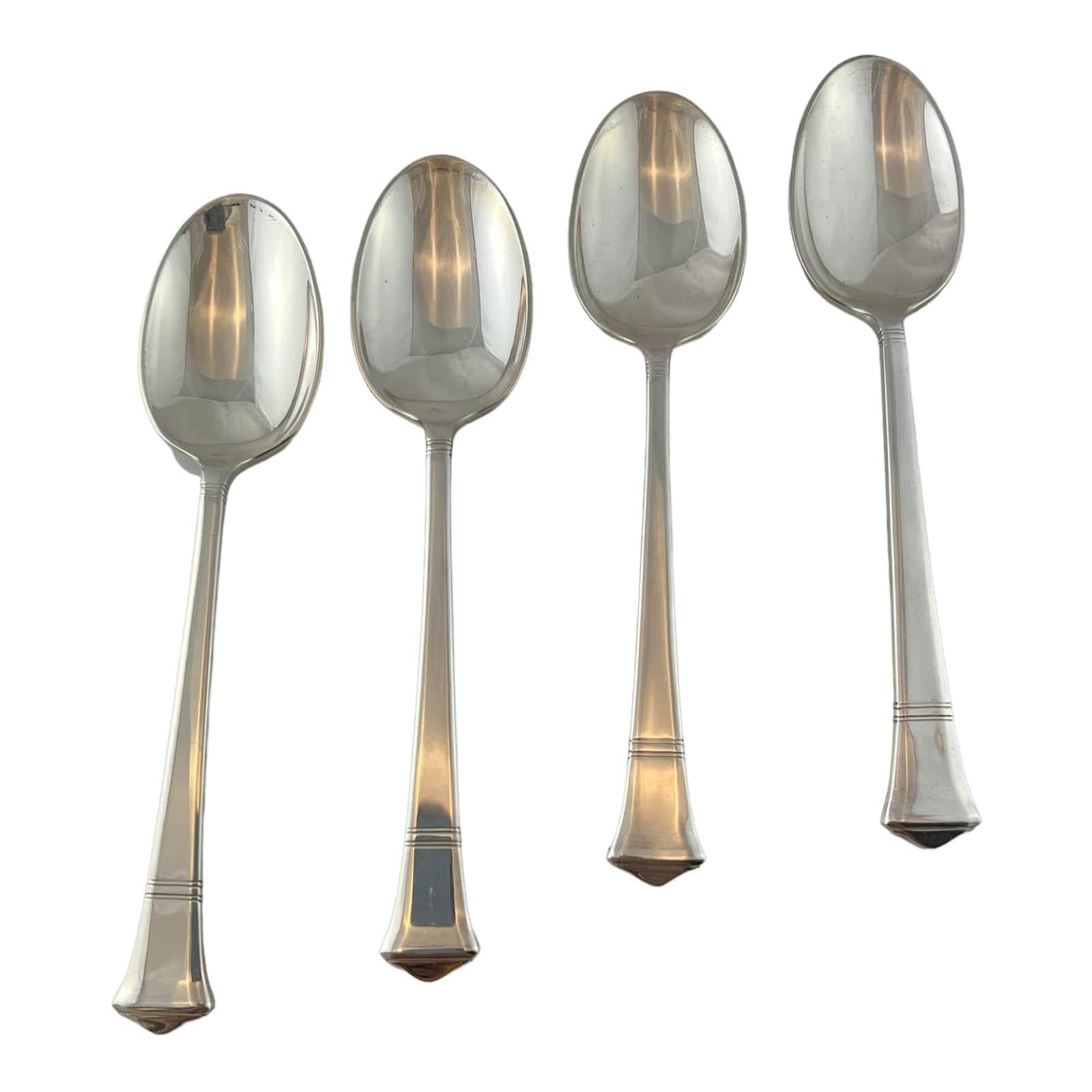 Set of 4 sterling silver teaspoons by Tiffany & Co in the Windham pattern.

No monogram.

Beautiful set of teaspoons in the Windham pattern which was in produced in 1923 and designed by Aurthur LeRoy Barney. The pattern's simple and elegant