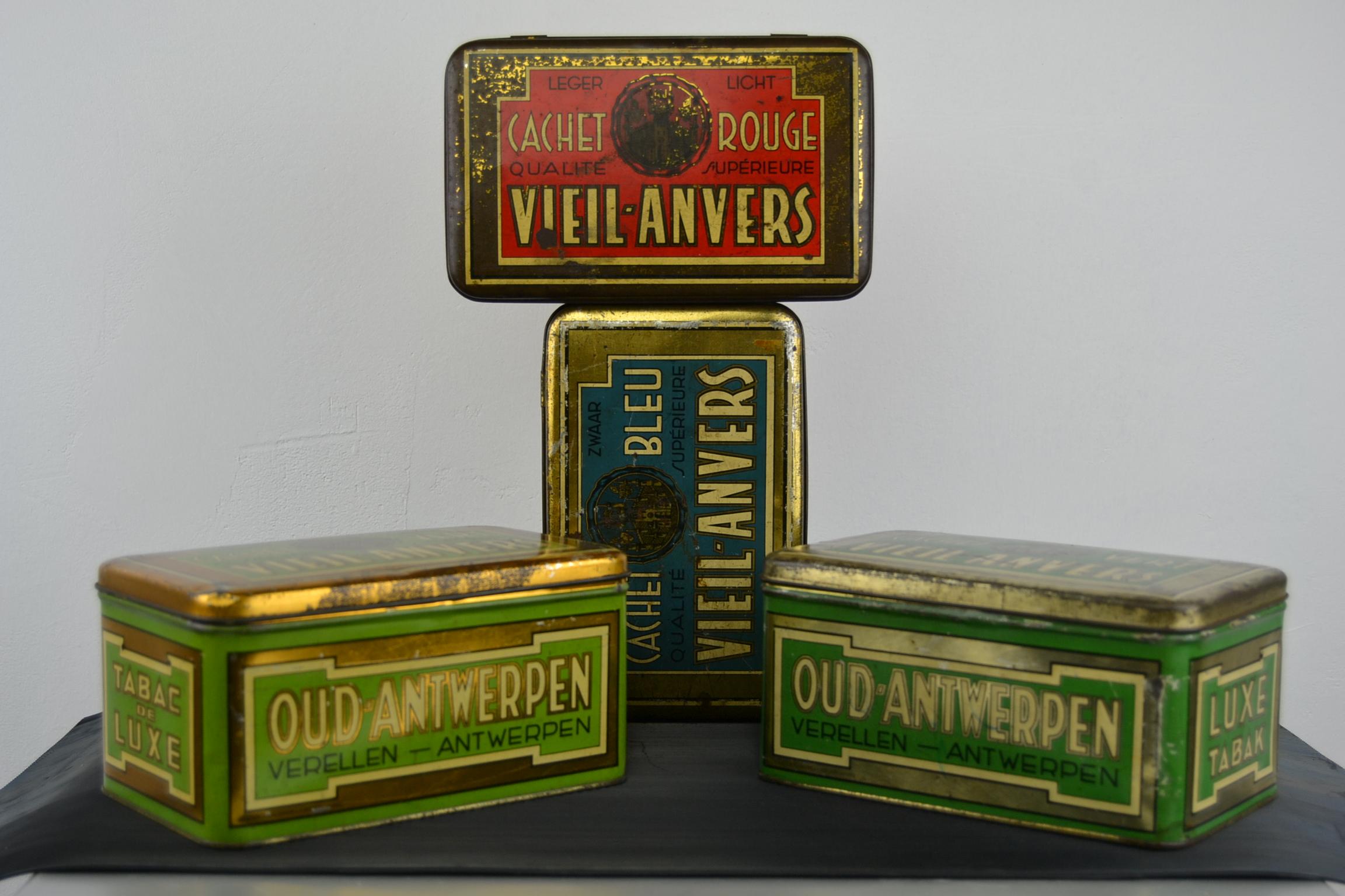 1950s Set of 4 Tobacco Boxes - Tobacco Tins - Cigar Boxes.
These Tins are in different colors: red, blue, green and light green what makes them great to display. 
Vintage Tins Tobacco Vieil Anvers, Old Antwerp.
Cigar Company Verellen.

All in good