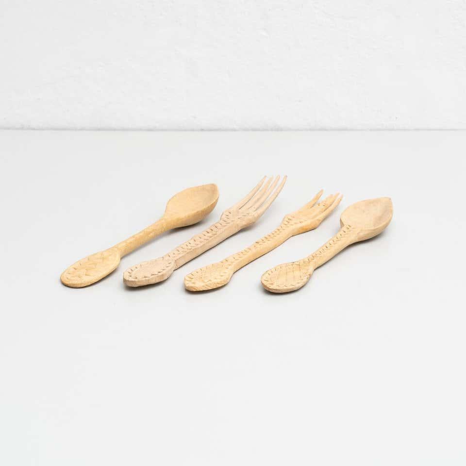 Early 20th Century Set of 4 Traditional Wooden Pastoral Primitive Carved Fork and Spoon For Sale