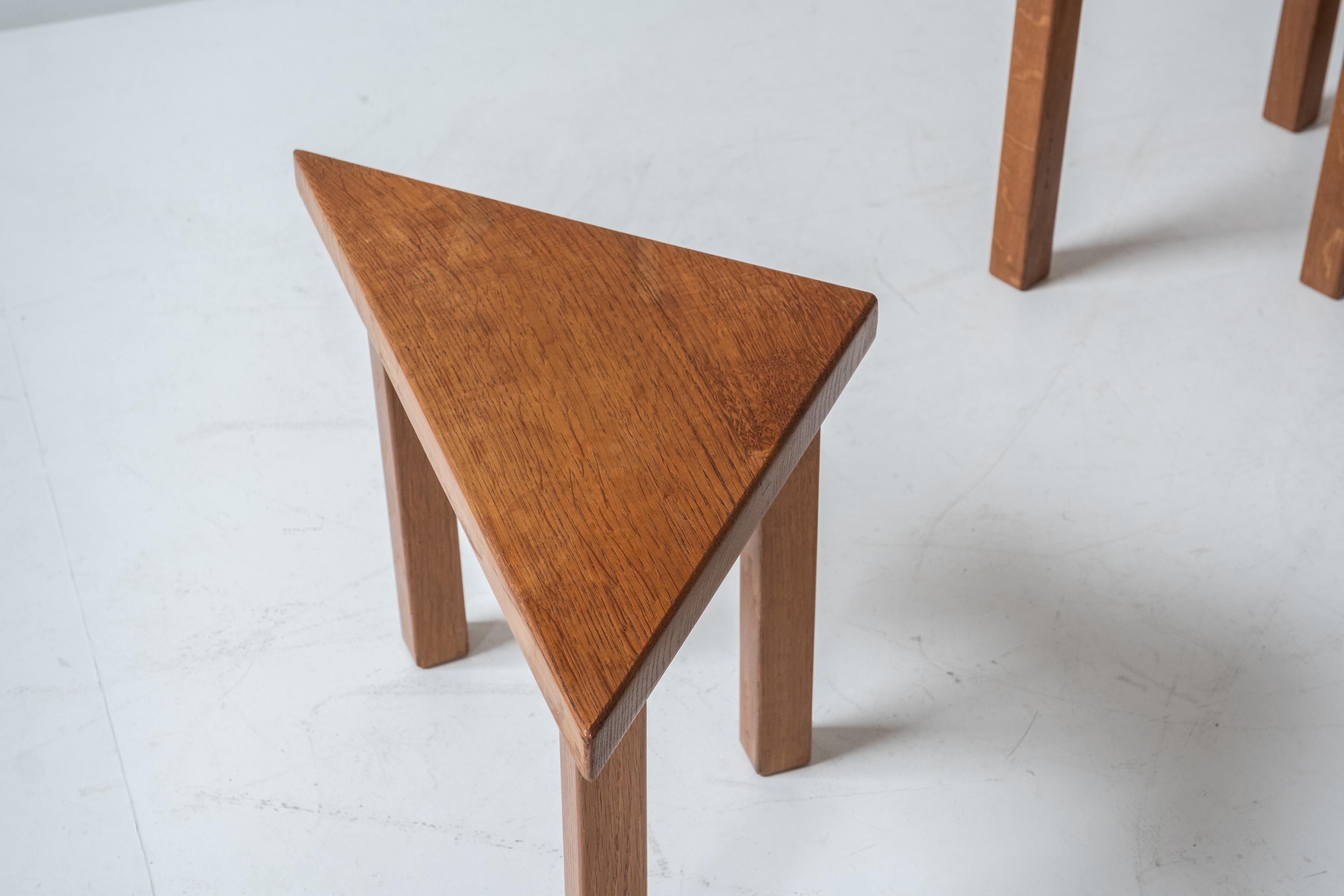 Set of 4 triangle shaped oak side tables from the 1960s.  3