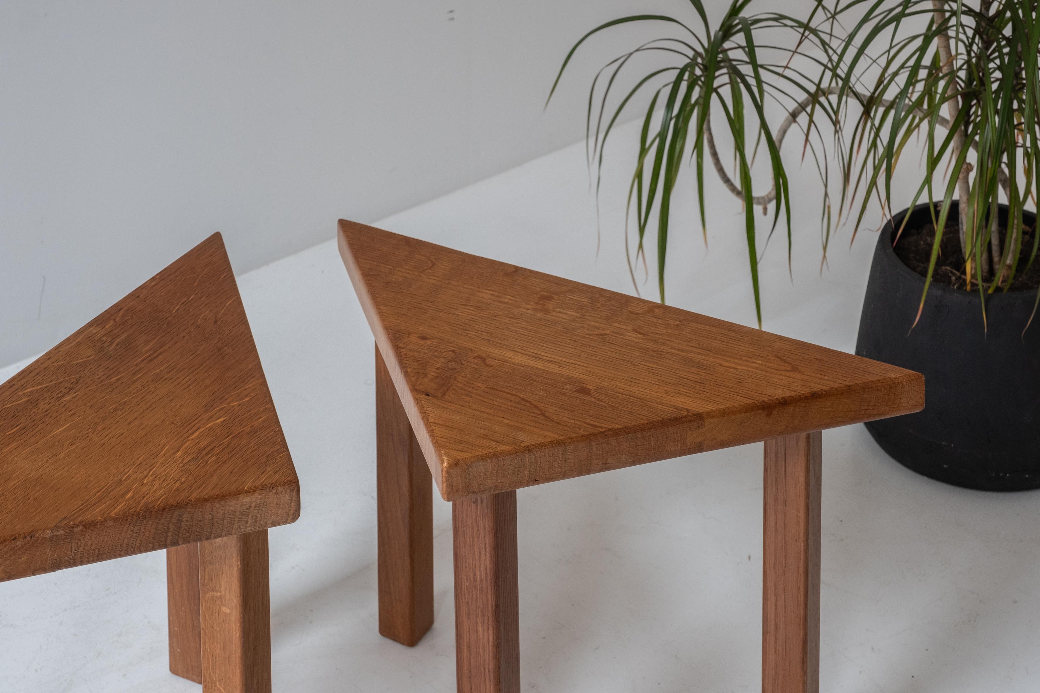 Set of 4 triangle shaped oak side tables from the 1960s.  4