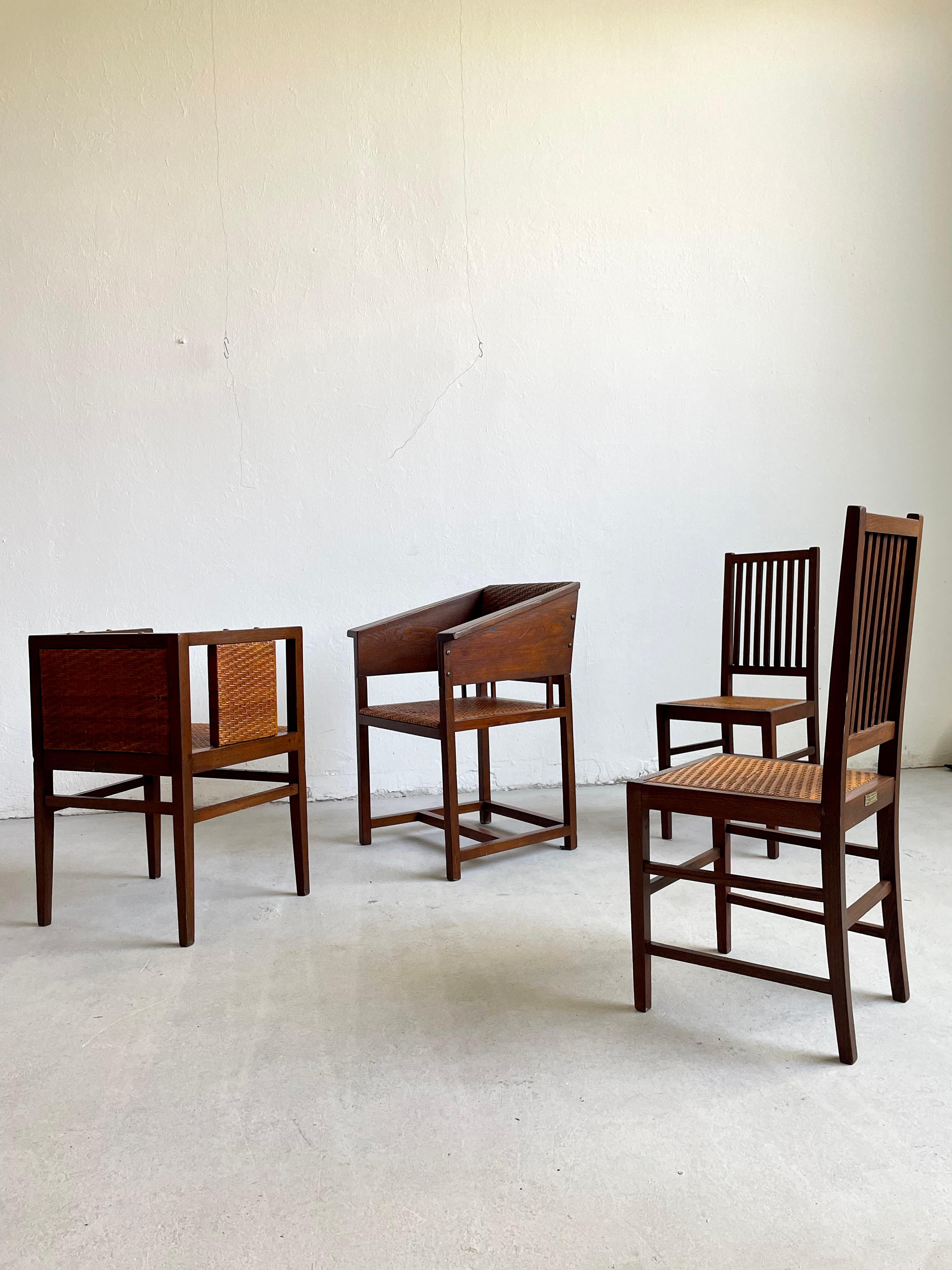 This set of 4 chairs manufactured by Prag-Rudniker Korbfabrikation in 1902 represents a nice, museum quality collection of important design of the Vienna Secession. 

The collection includes tinted Oak and Cane Chair Mod. 464 and a pair of
