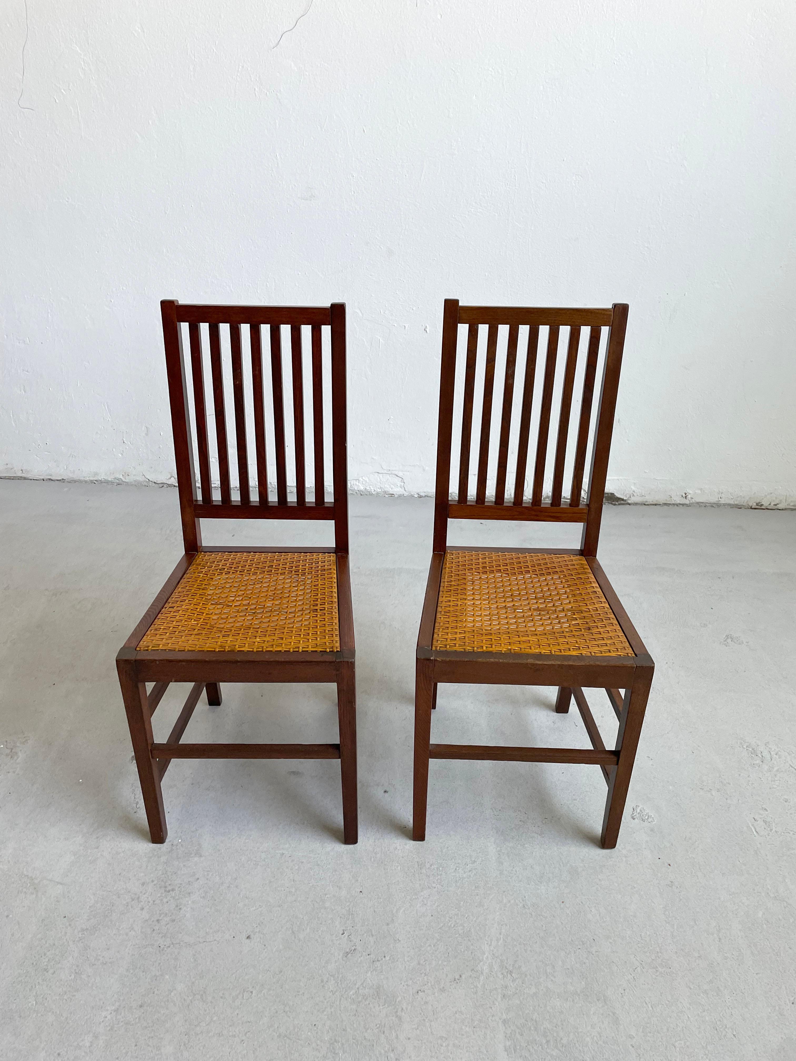 Canne Ensemble de 4 chaises de sécession viennoise en chêne et rotin par H. Vollmer et W. Schmidt  en vente