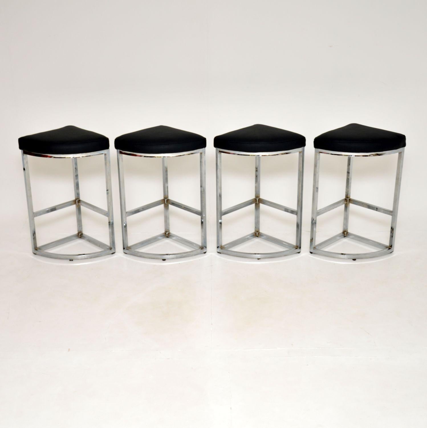 A beautiful set of four wedge shaped bar stools in chrome. These were made in France, they date from around the 1970’s.

They are beautifully made and have a great design, they can be pushed together to make a circular shape to fit around a tall