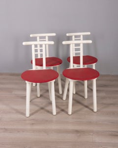 Set of 4 vintage 1980s chairs made of wood and red vinyl, Italian design