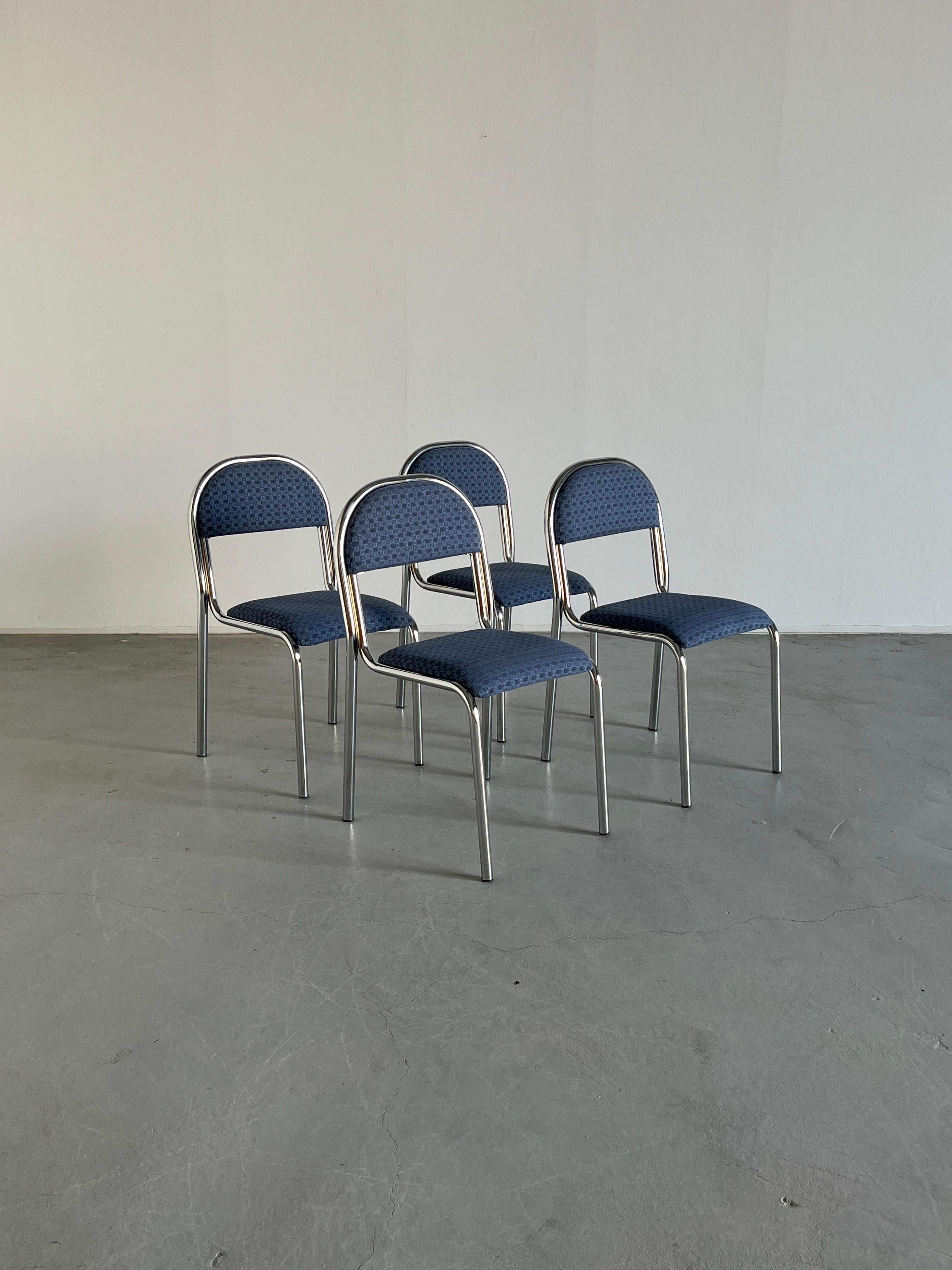 Set of four Italian dining chairs, made from chromed tubular steel frame with a curved structure and upholstered seat and backrest.
Unique design, high quality materials and craftsmanship.
Stackable.

Overall very well preserved and in very good