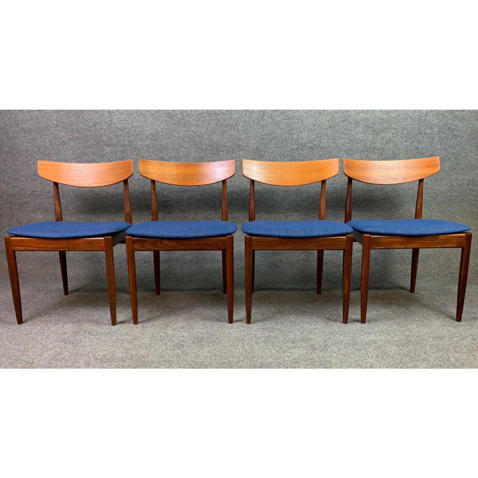 Here is a beautiful set of four MCM dining chairs in teak designed by Ib Kofod-Larsen for the 