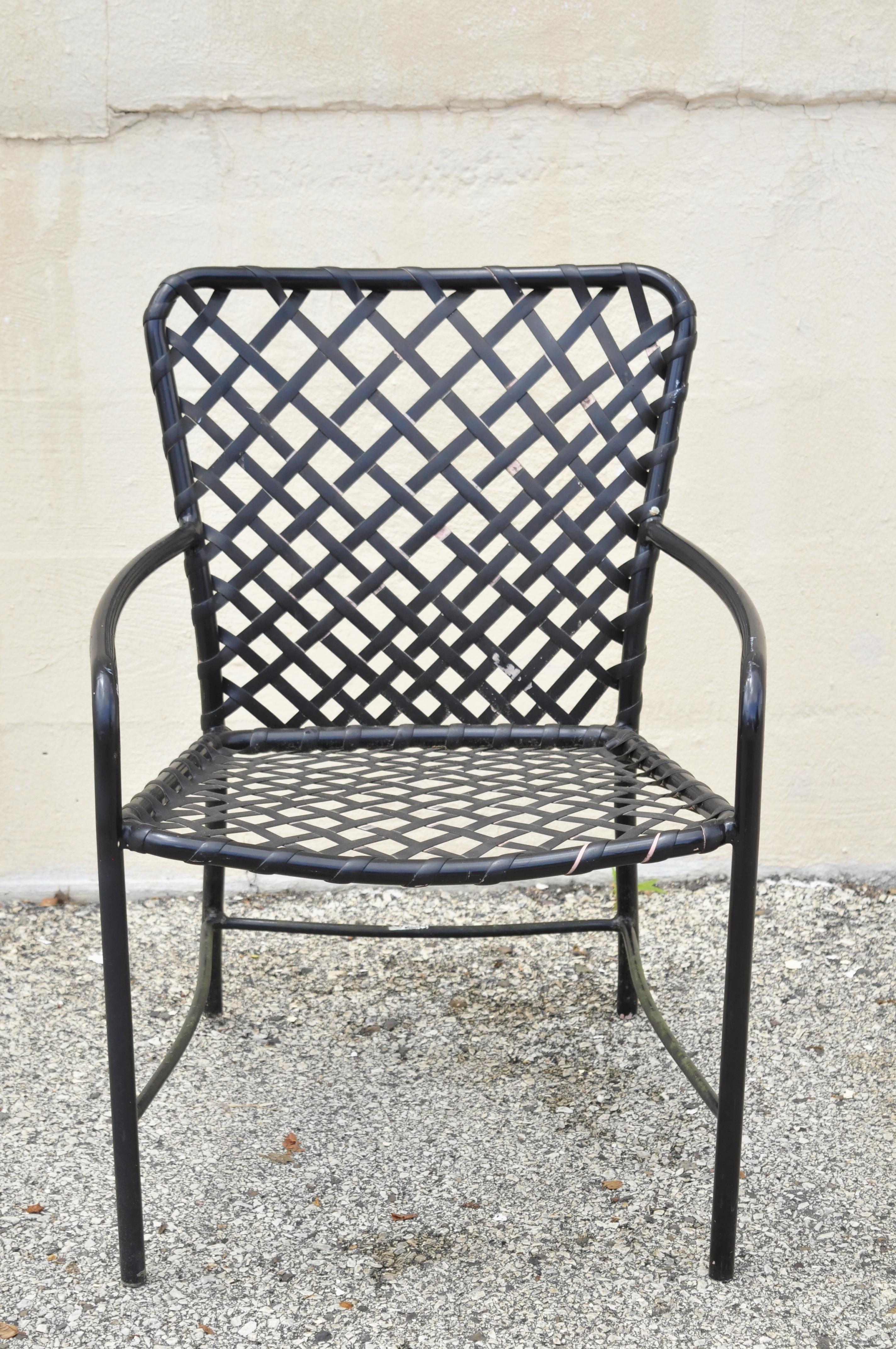 Set of 4 vintage brown Jordan Tamiami patio pool dining armchairs. Item features aluminum frames, lace vinyl back and seats, great American craftsmanship, great style and form, circa late 20th century. Measurements: 31