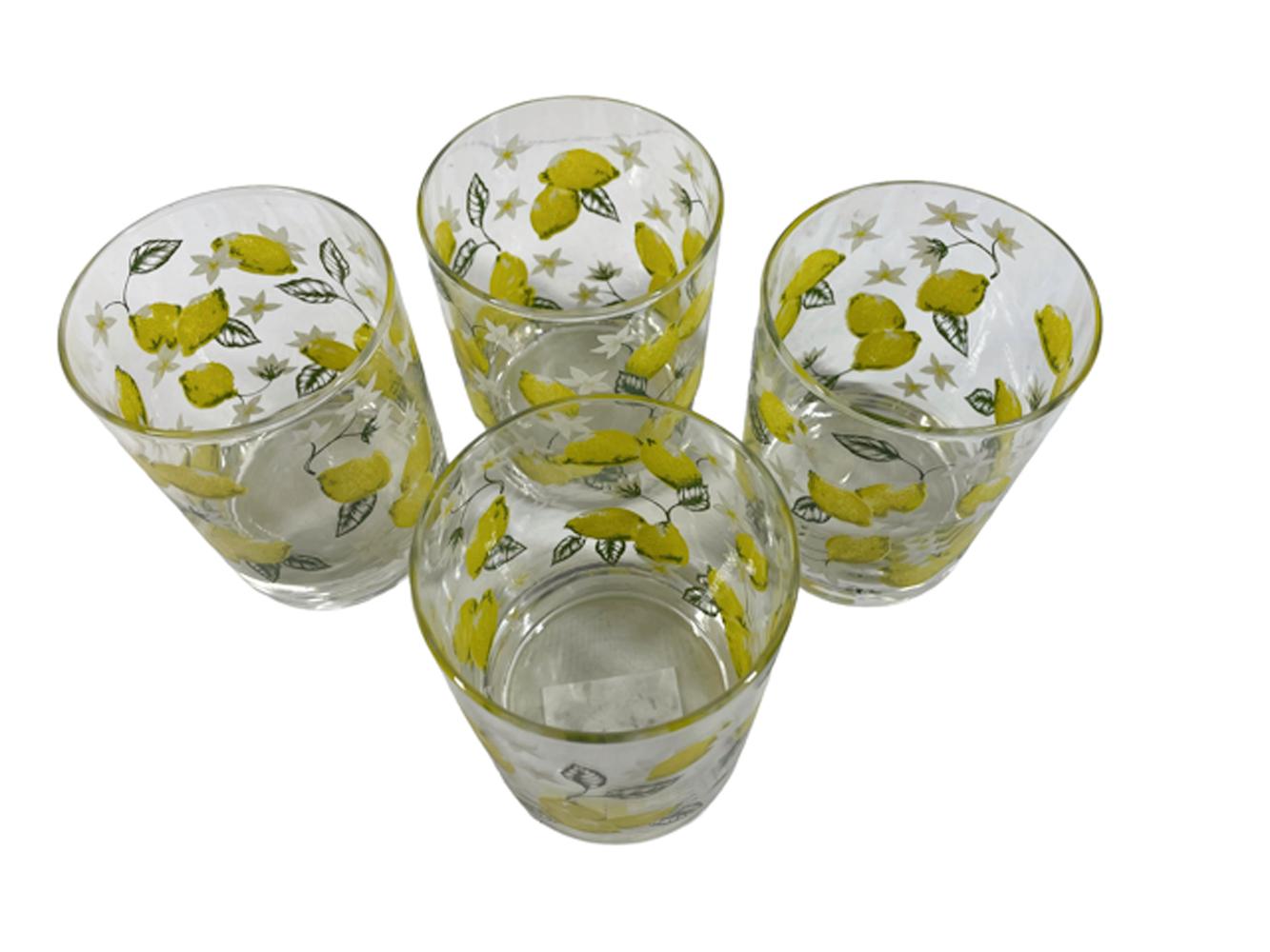 Four vintage rocks glassed by Cera Glass with lemons, leaves and blossoms in yellow, green and white on clear glass.