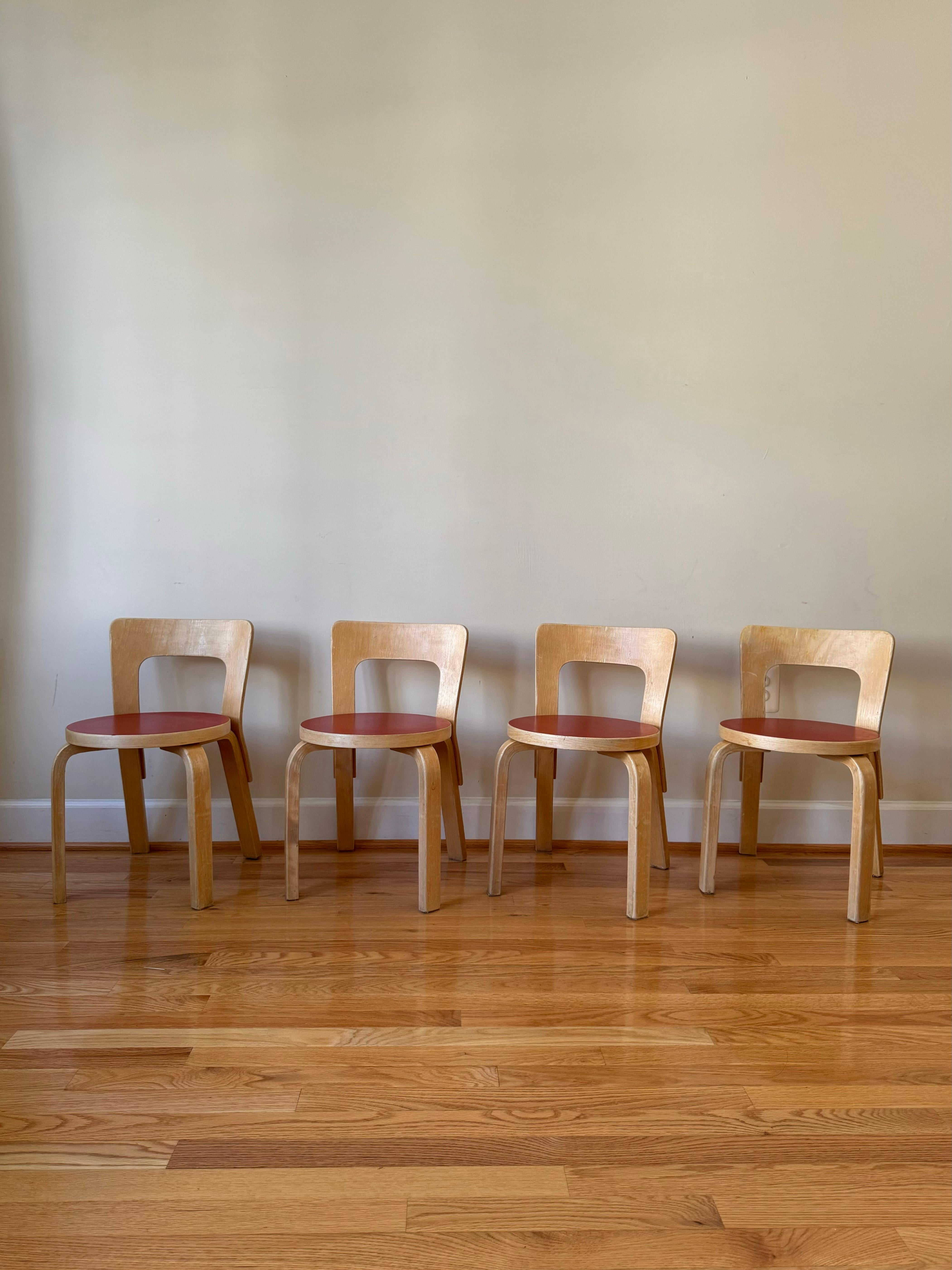 Children’s Chair N65 boasts clean lines and a simple, elemental structure. 
The chair models a low rectangular backrest formed from a single piece of birch plywood. Since the backrest follows a slight curve, it forms naturally to the back, offering