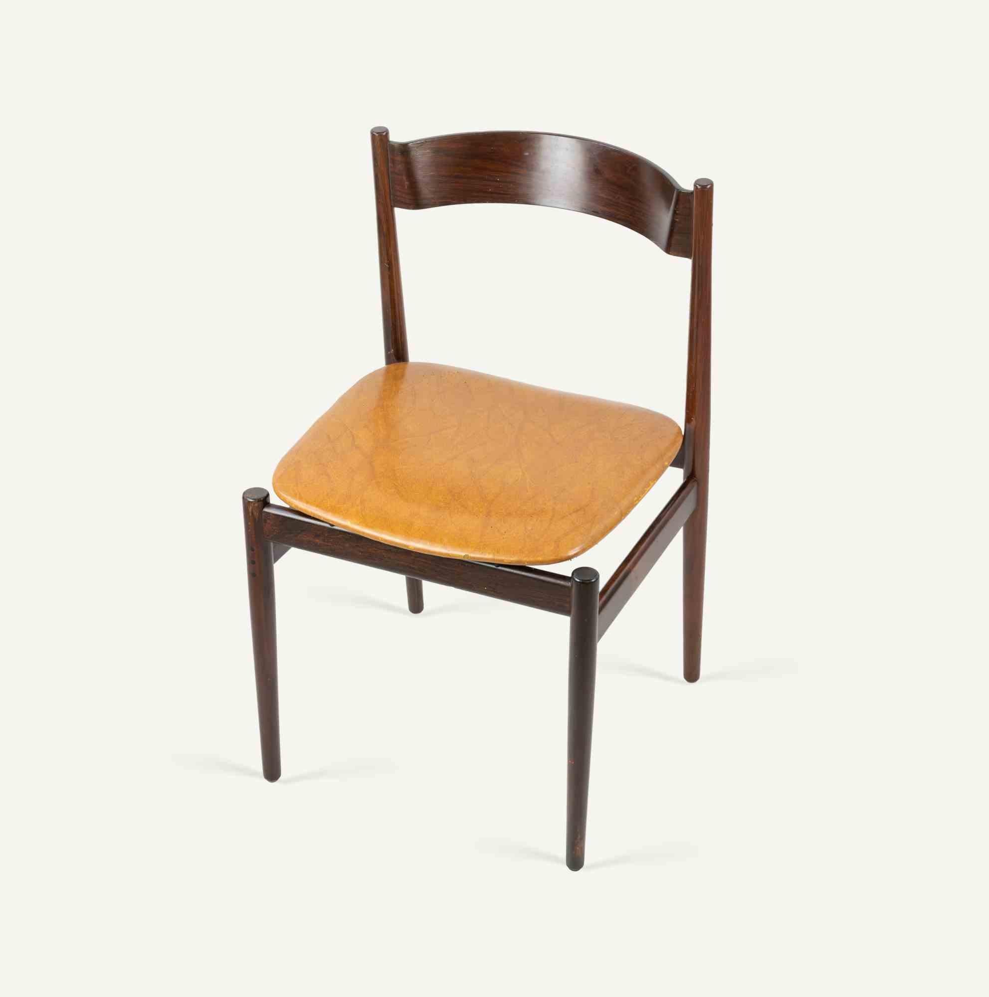 Satz von 4 Vintage-Stühle italienische Herstellung 1960er Jahre, in Holz und Lackleder.

Sehr guter Zustand.