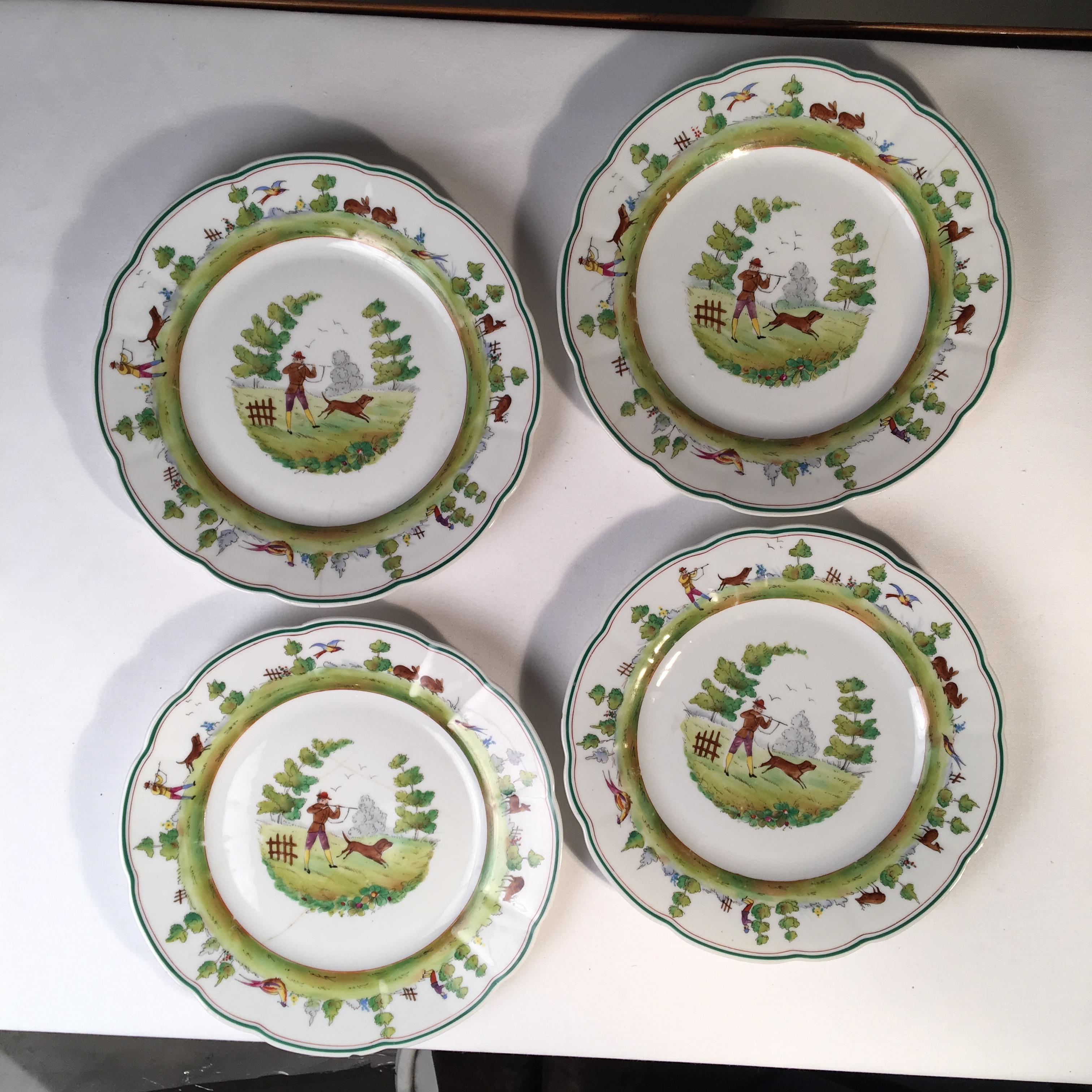 A set of 4 unusual Cowell & Hubbard hunting theme pictorial porcelain plates.