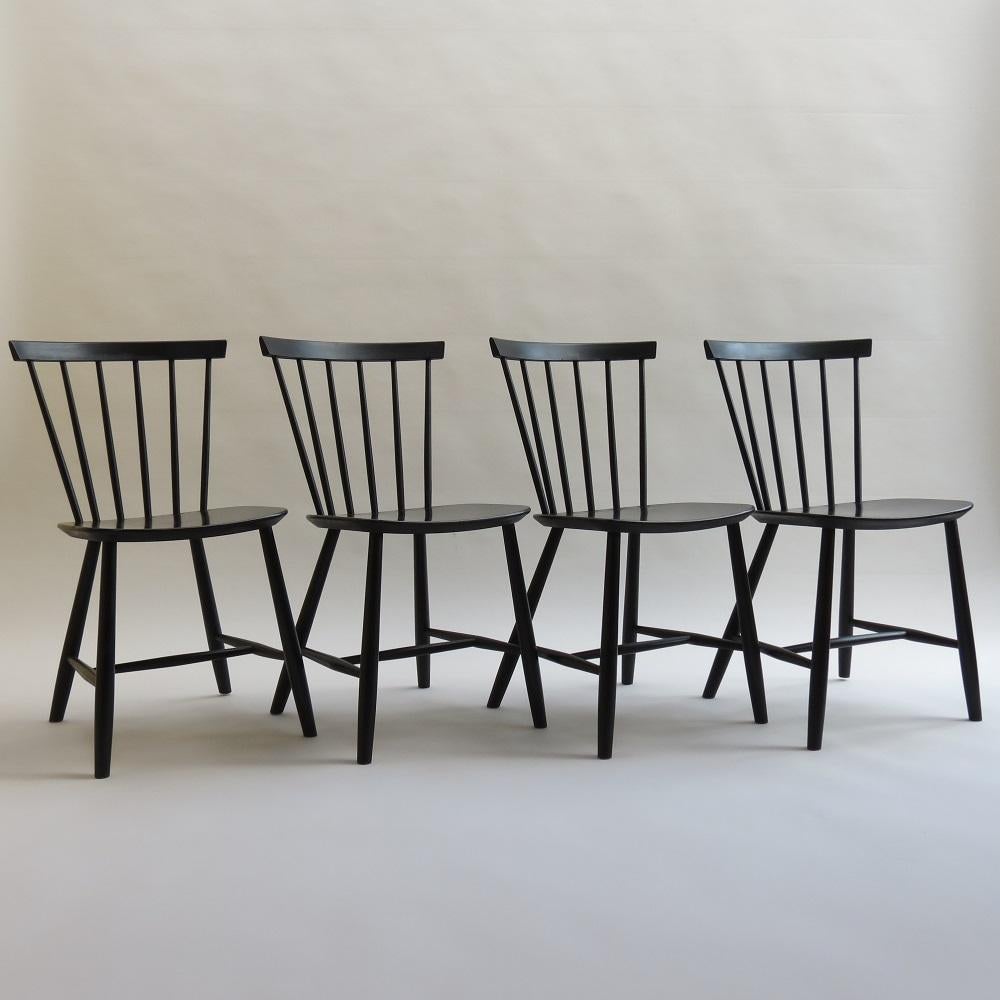 Set of 4 dining chairs designed by Poul M Volter in 1956 and manufactured by FDB Mobler, Denmark. Model Number J46

In good vintage condition. Signs of use and distressing to the seats and legs.

ST1335.