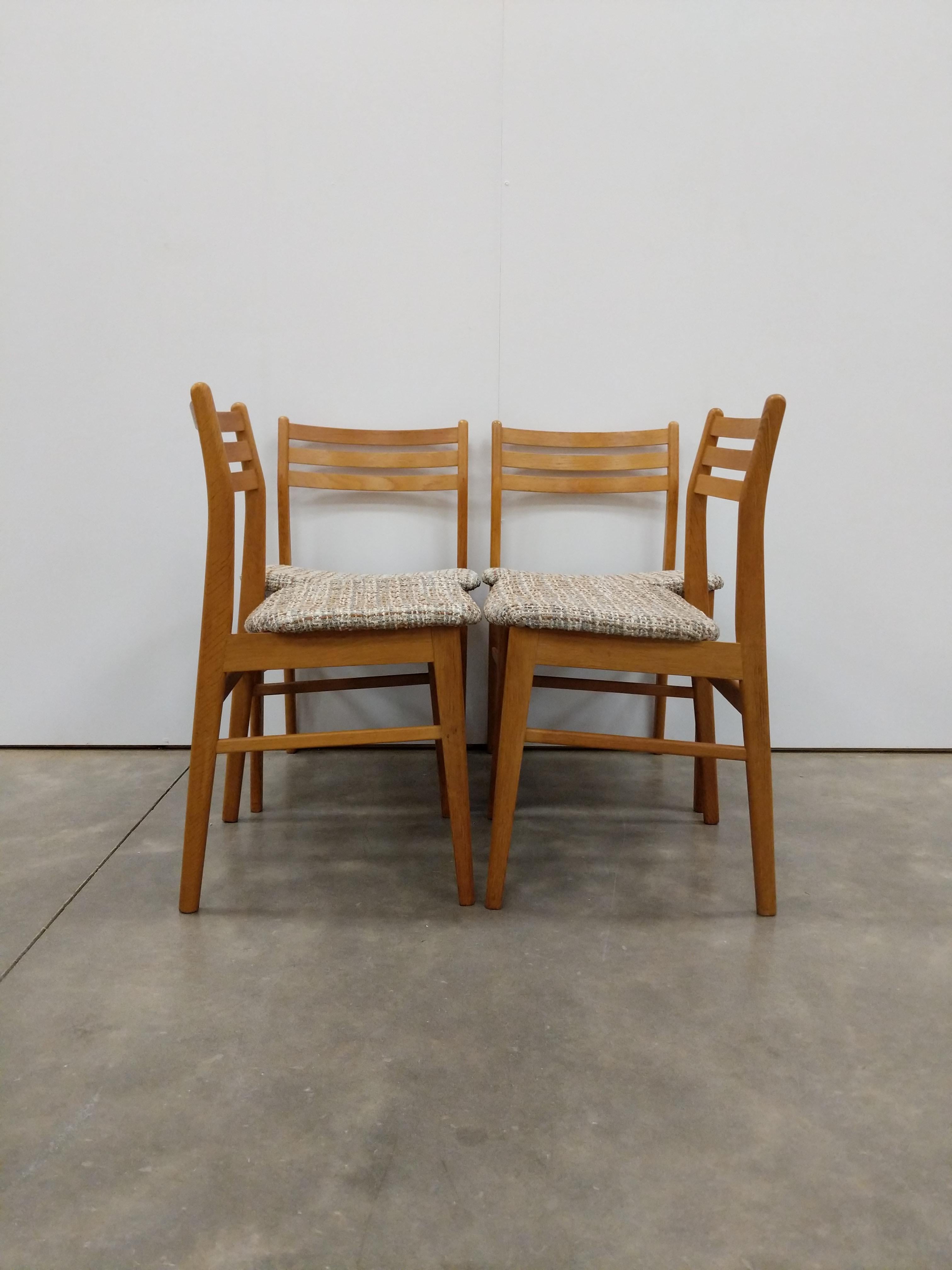 Set of 4 authentic vintage mid century Danish / Scandinavian Modern dining chairs.

By Sax Møbler.

Maker's stamp on bottoms.

This set is in excellent condition with brand new upholstery (see photos).

If you would like any additional details,