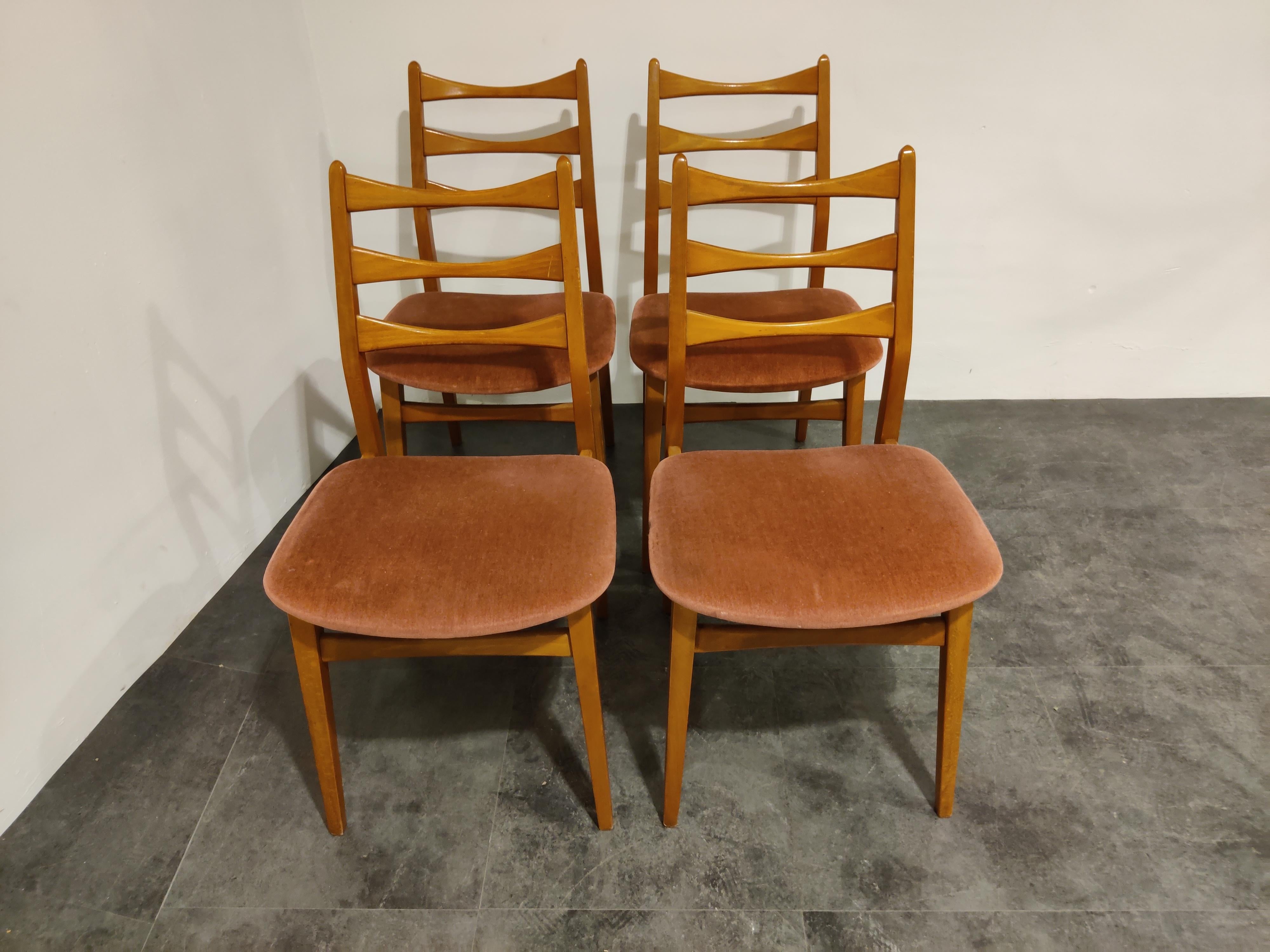 Midcentury teak wooden dining chairs with original fabric upholstery.

Good condition.

Labelled 'Mignon mobel'.

Nice and elegant design

1960s Germany

Measures: Height 87cm/34.25
