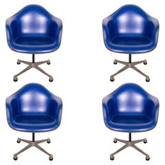 Set of 4 Vintage Eames Herman Miller Molded Fiberglass Blue Leather Swivel Chair