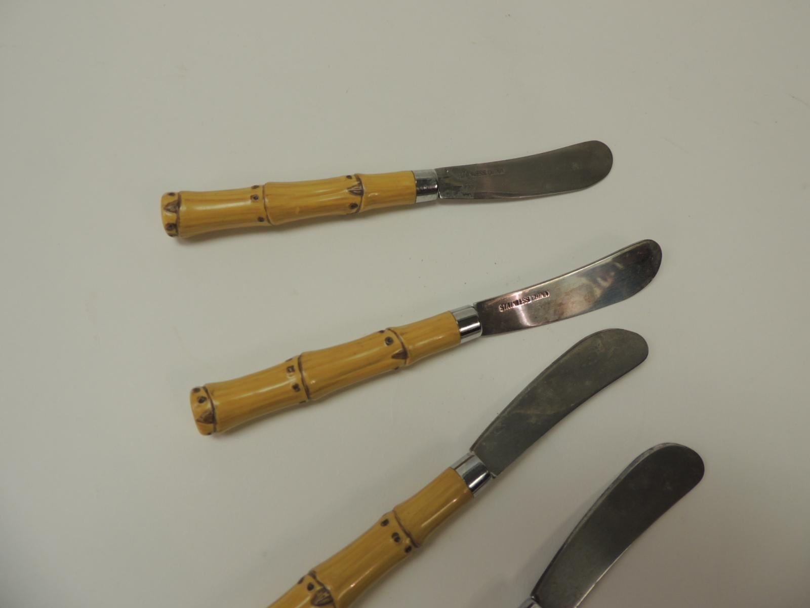 Set of (4) vintage bamboo handles butter knives.
Stainless with faux bamboo,
China, 1980s.
Size: 6.5 x 3/4.