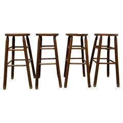 Set of 4 vintage French arts and crafts solid wood bar stools