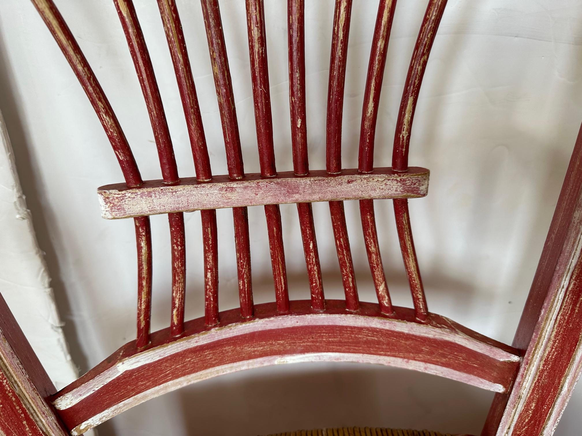 Set of 4 Vintage French Country Red Painted Dining Chairs with Rush Seats In Distressed Condition For Sale In Hopewell, NJ