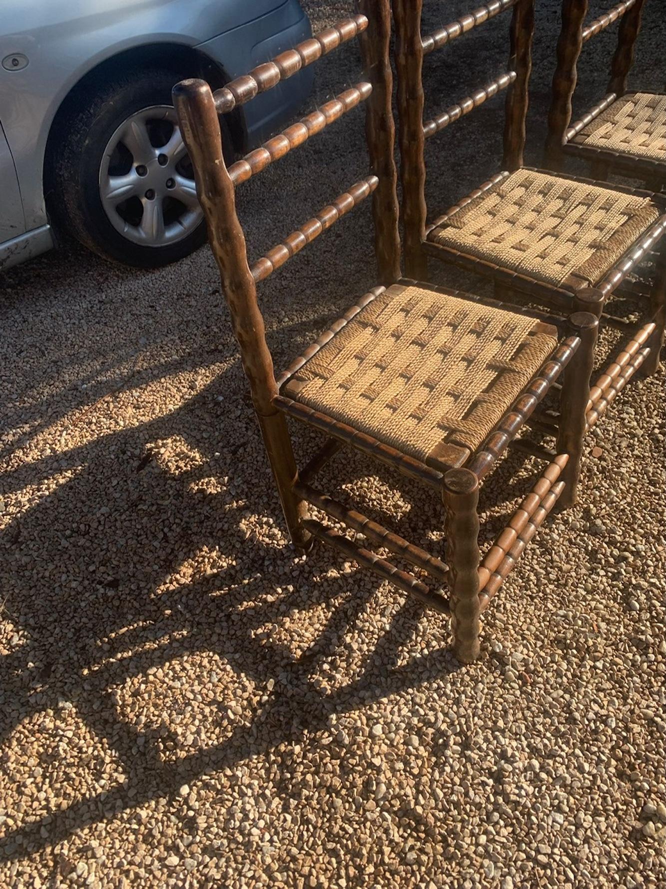 Carved Set of 4 Vintage French Rustic Chairs – Woven Seats, Turned Wood Frame For Sale