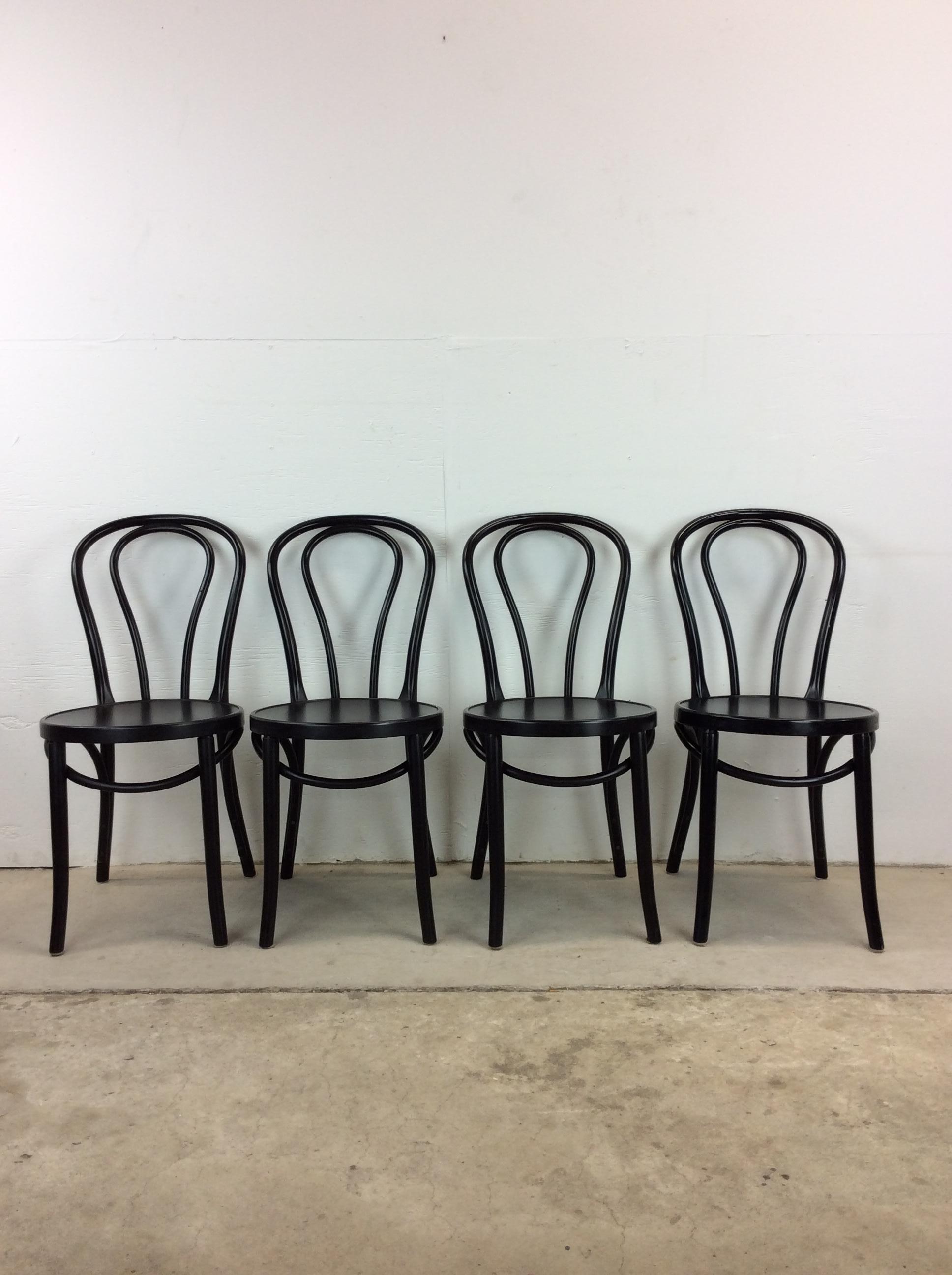 This set of 4 vintage Ikea chairs features classic cafe style design and durable plastic construction.

Complimentary black & white vintage Ikea dining table available separately.

Dimensions: 15.75w 14.5d 32.75h 17.75sh

Condition: Original lacquer