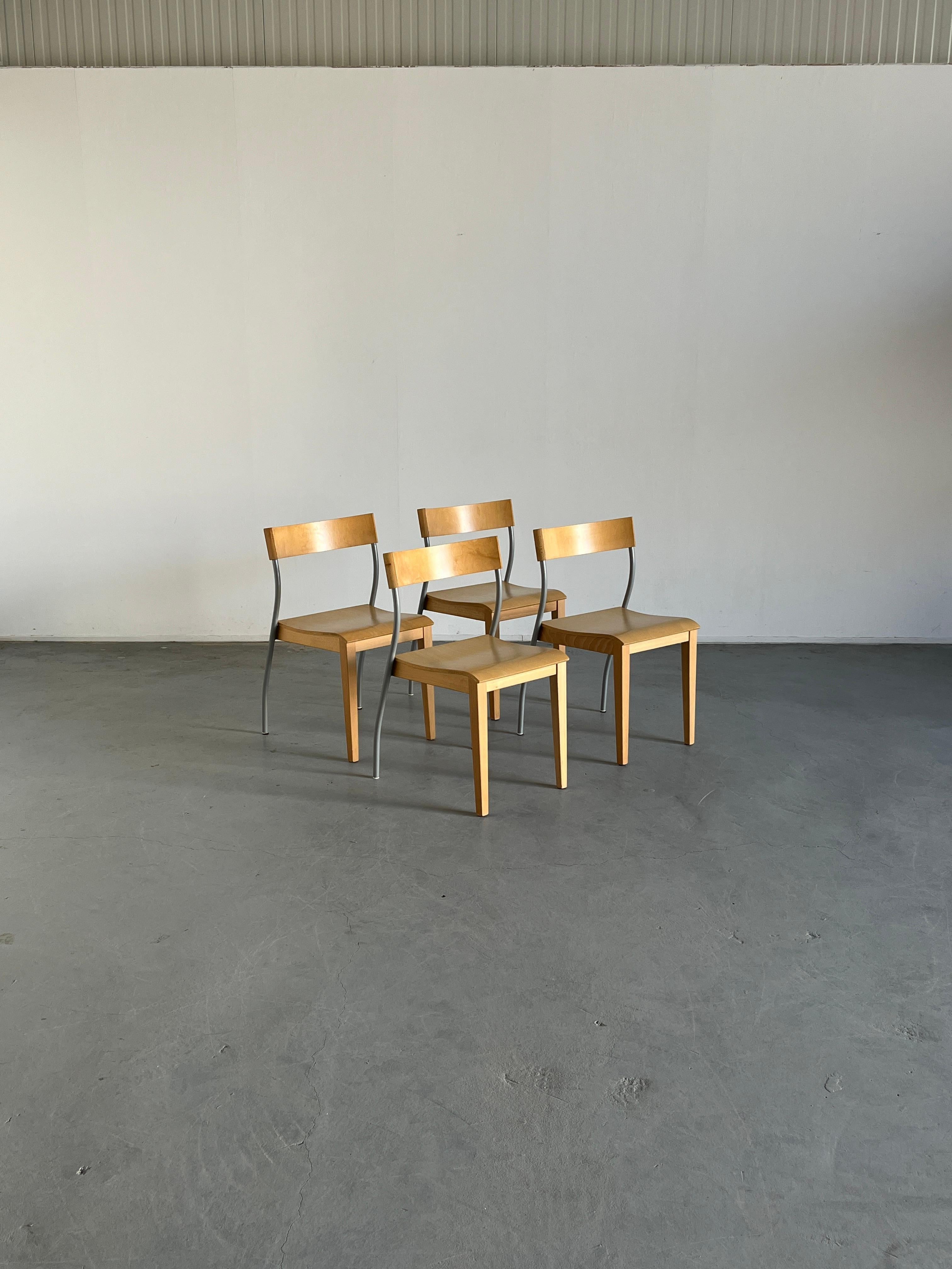 Set of four vintage Ikea 'Nordisk' stackable dining chairs.
Designed by Tina Christensen, 1992.
In the manner of Philippe Starck.
Beech / birch veneer, lacquered steel.

Well preserved and in good condition with smaller expected signs of age, as