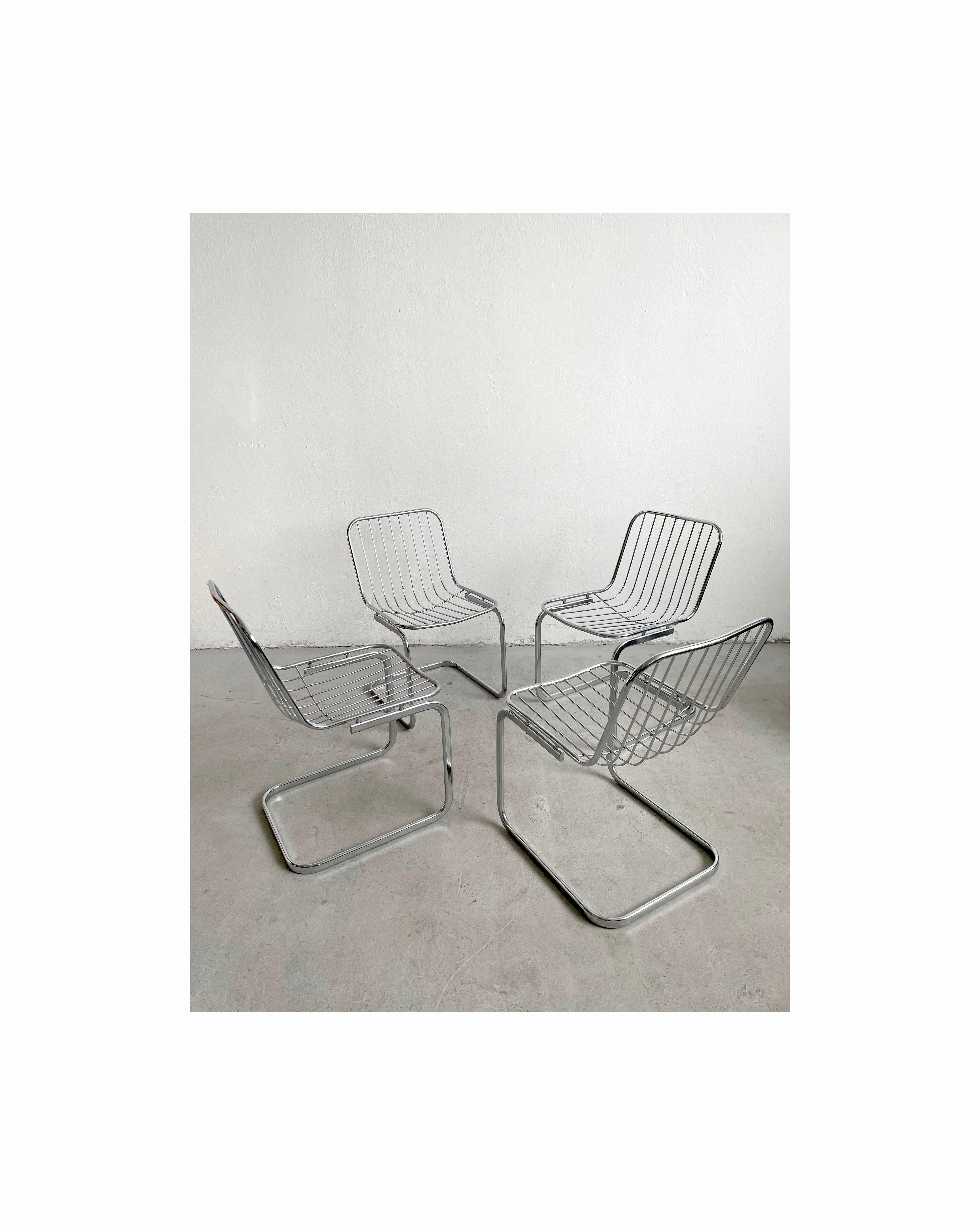 Set of 4 Italian dining chairs made by Gastone Rinaldi or made in his style, Italy 1970's - 1980's

The chairs have creme color cushions made of wool-like fabric, and they remain in a very good condition, with some small traces of wear.

The metal
