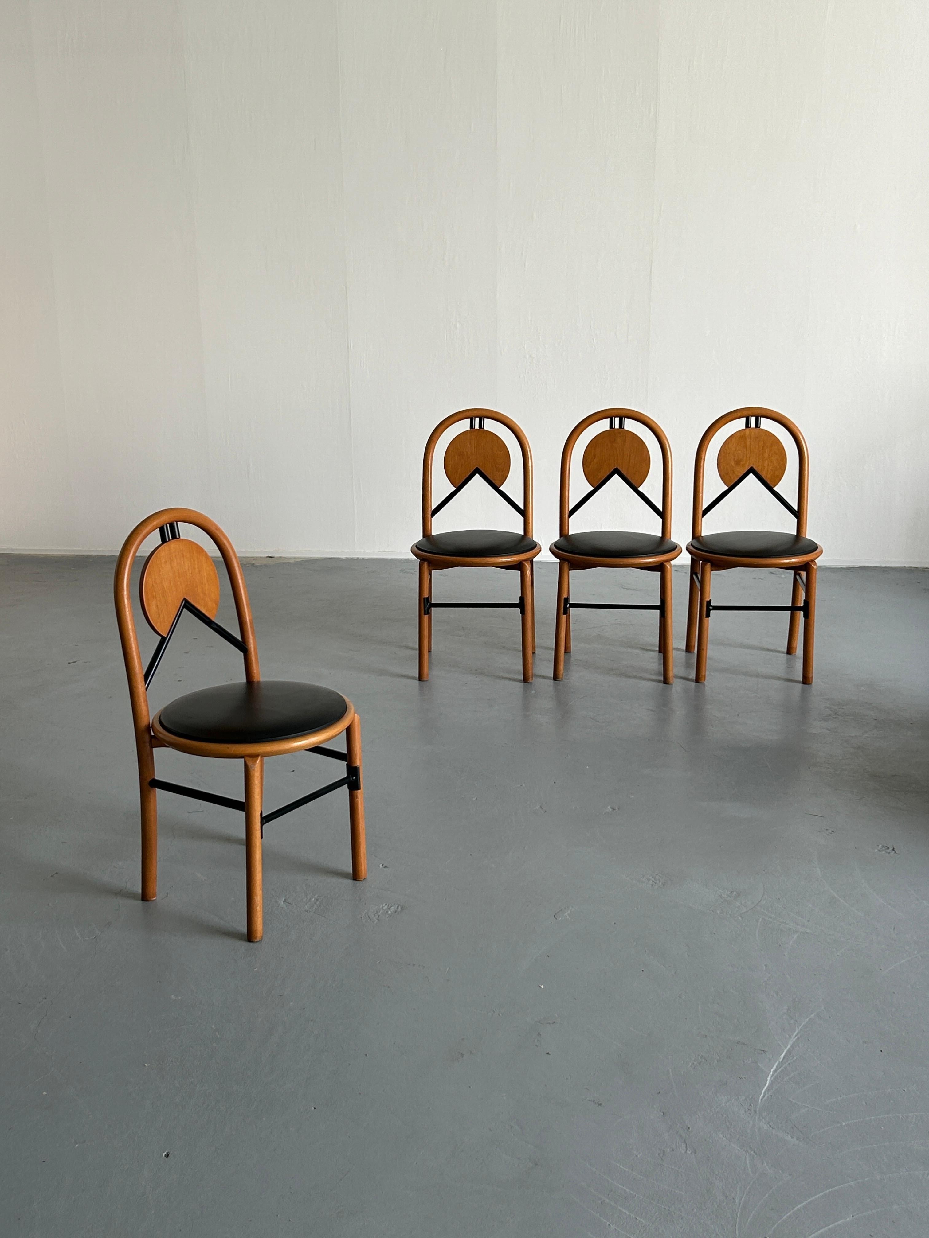 A set of four stunning vintage Italian postmodernist chairs, following the Memphis Milano style.
Unknown Italian production, late 1980s or early 1990s.
Overall, the chairs are well preserved, in original vintage condition and with expected signs of