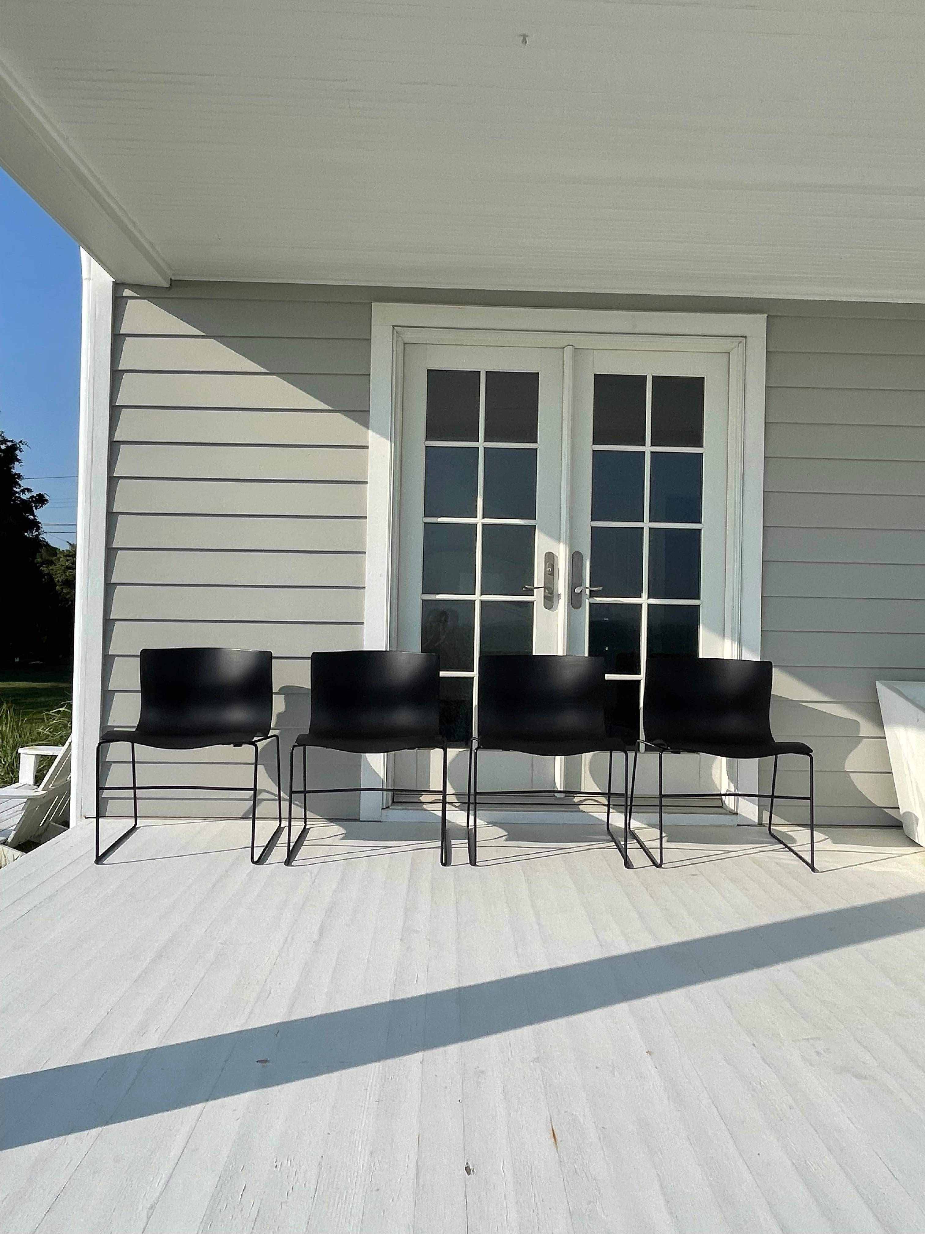 Vintage knoll set of 4 black Handkerchief Chairs designed by Massimo and Lella Vignelli. The ergonomic seat made of molded fiberglass resembles a handkerchief in the wind . Very comfortable and stackable . 