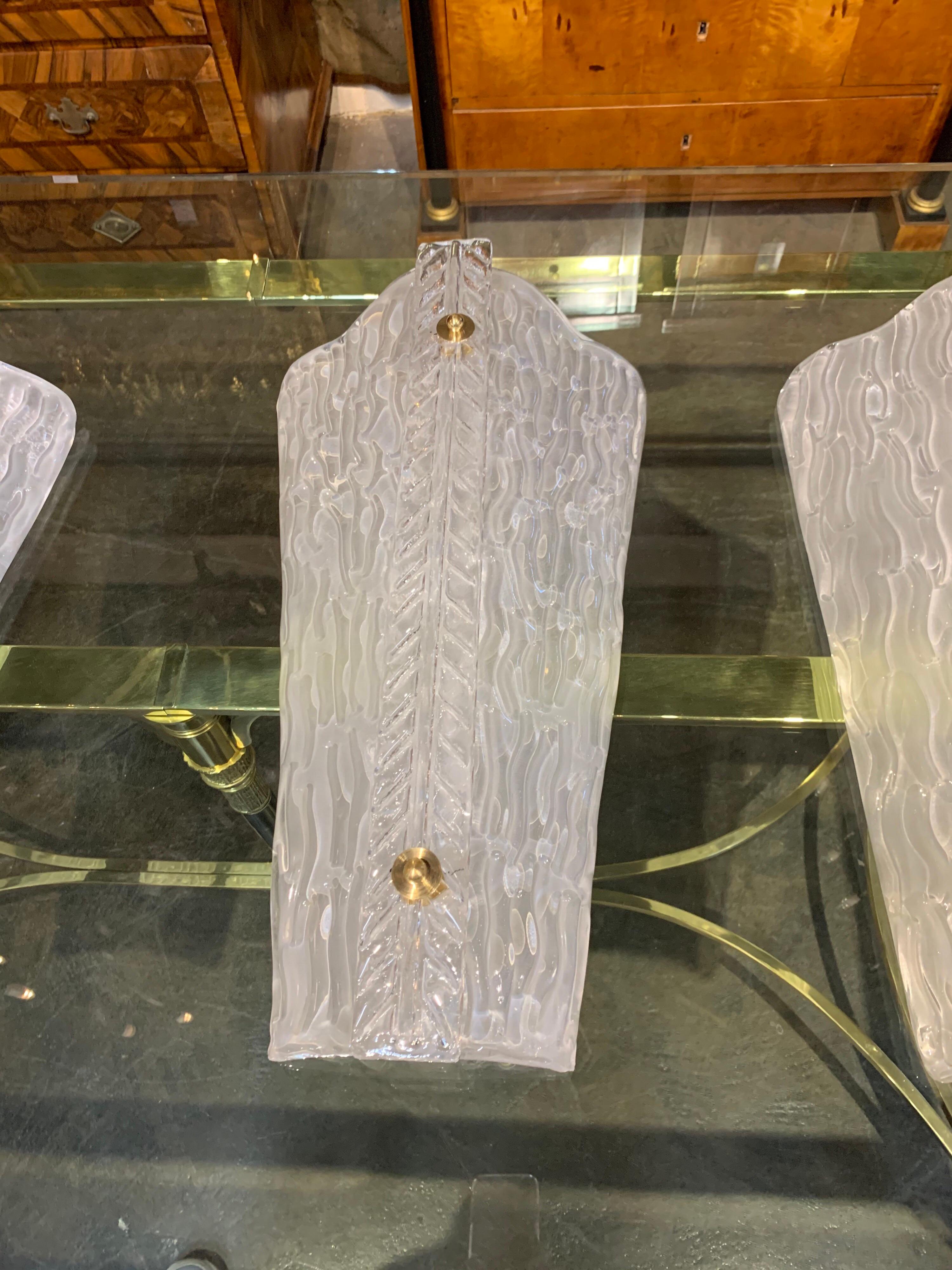 Very elegant set of 4 large scale Murano glass sconces. Each sconce has 3-light. These would work well in a variety of setting. Note: Would sell 2 for $3600.