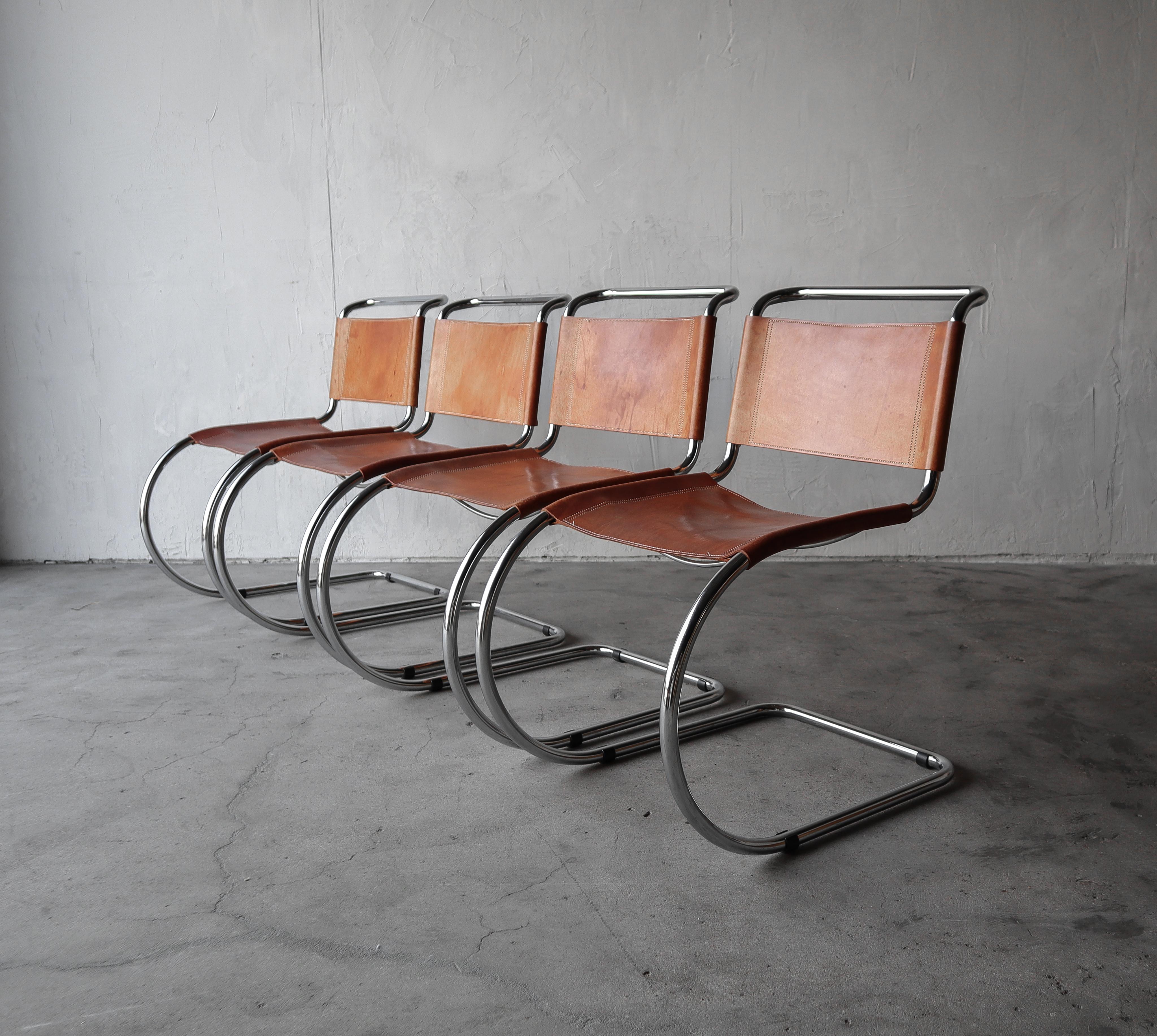 Great set of 4 vintage Bauhaus leather MR10 /S533 Spoleto dining chairs by Ludwig Mies van der Rohe. Chairs have been well loved and the leather shows wonderful patina, one chair has a moisture ring in the seat, see images for details. Chrome is
