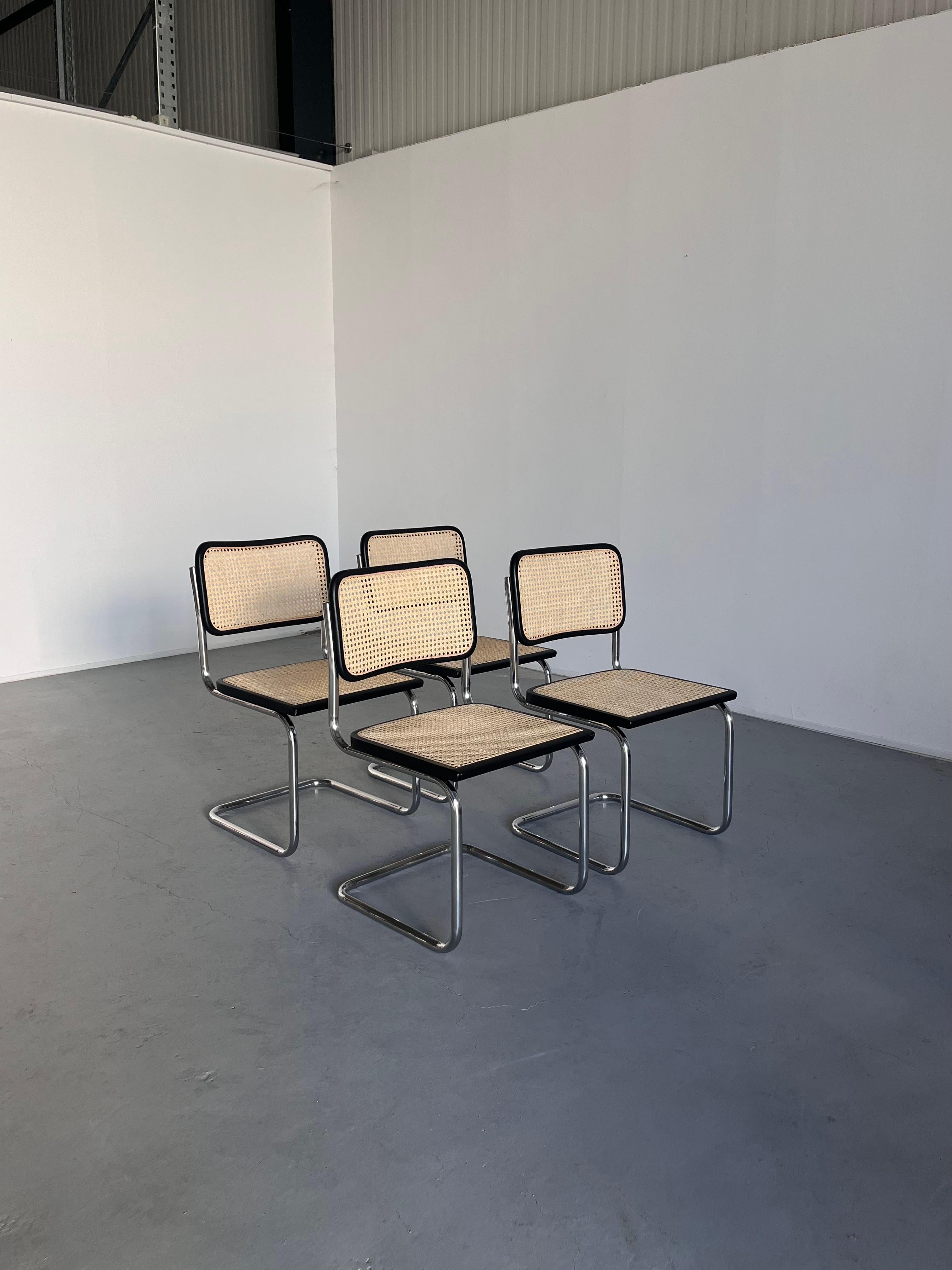 A set of four vintage Marcel Breuer design B32 cantilever chairs.
Italian production of the late 1980s / early 1990s.

In very good vintage condition with expected signs of age, mostly some surface scratches or smaller scuffs.
Chrome frames in good