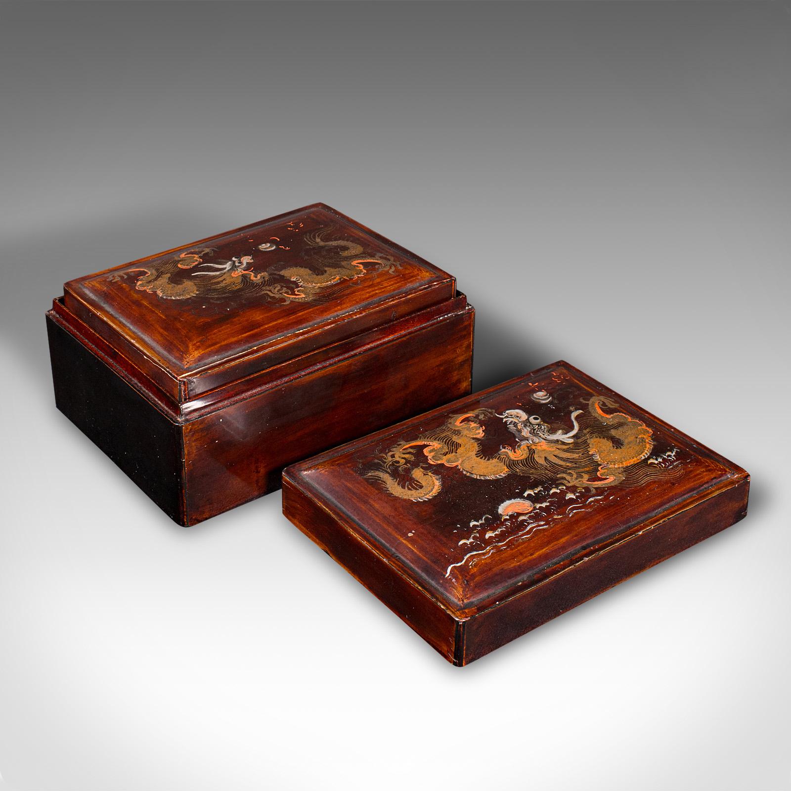 This is a set of 4 vintage nesting boxes. A Japanese, lacquered quartet of small storage boxes with handpainted decor, dating to the Art Deco period, circa 1930.

Fascinating quartet, with a neatly nesting form
Displaying a desirable aged patina and