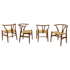 Set of 4 Vintage Patinated Hans Wegner CH24 Wishbone Dining Chairs in Oak