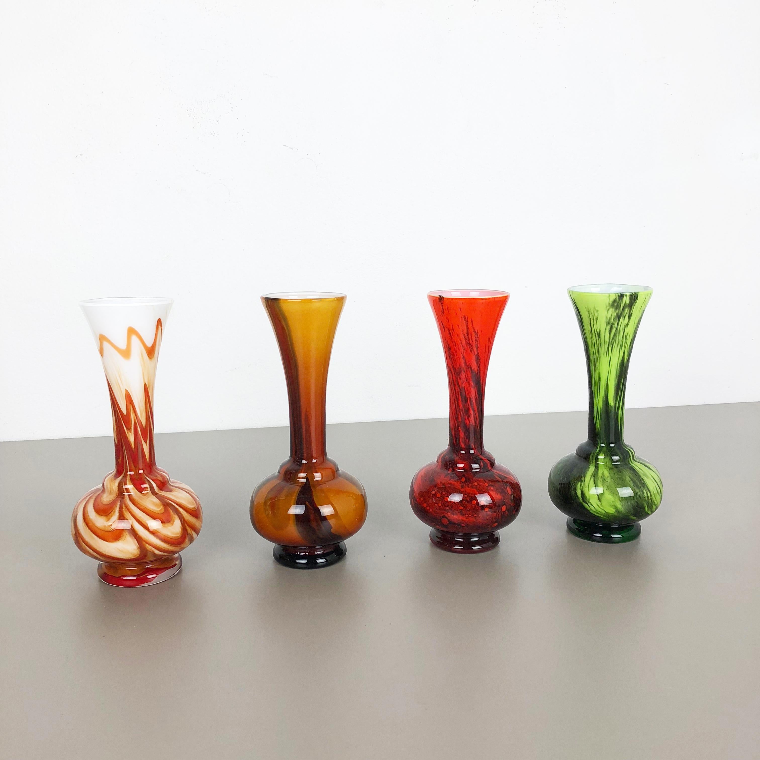 Article: Pop Art vase set of 2

Producer: Opaline Florence

Design: Carlo Moretti

Decade: 1970s.

Description: Original vintage 1970s Pop Art hand blown vase set made in Italy by Opaline Florence. Made of high quality Italian opal glass.