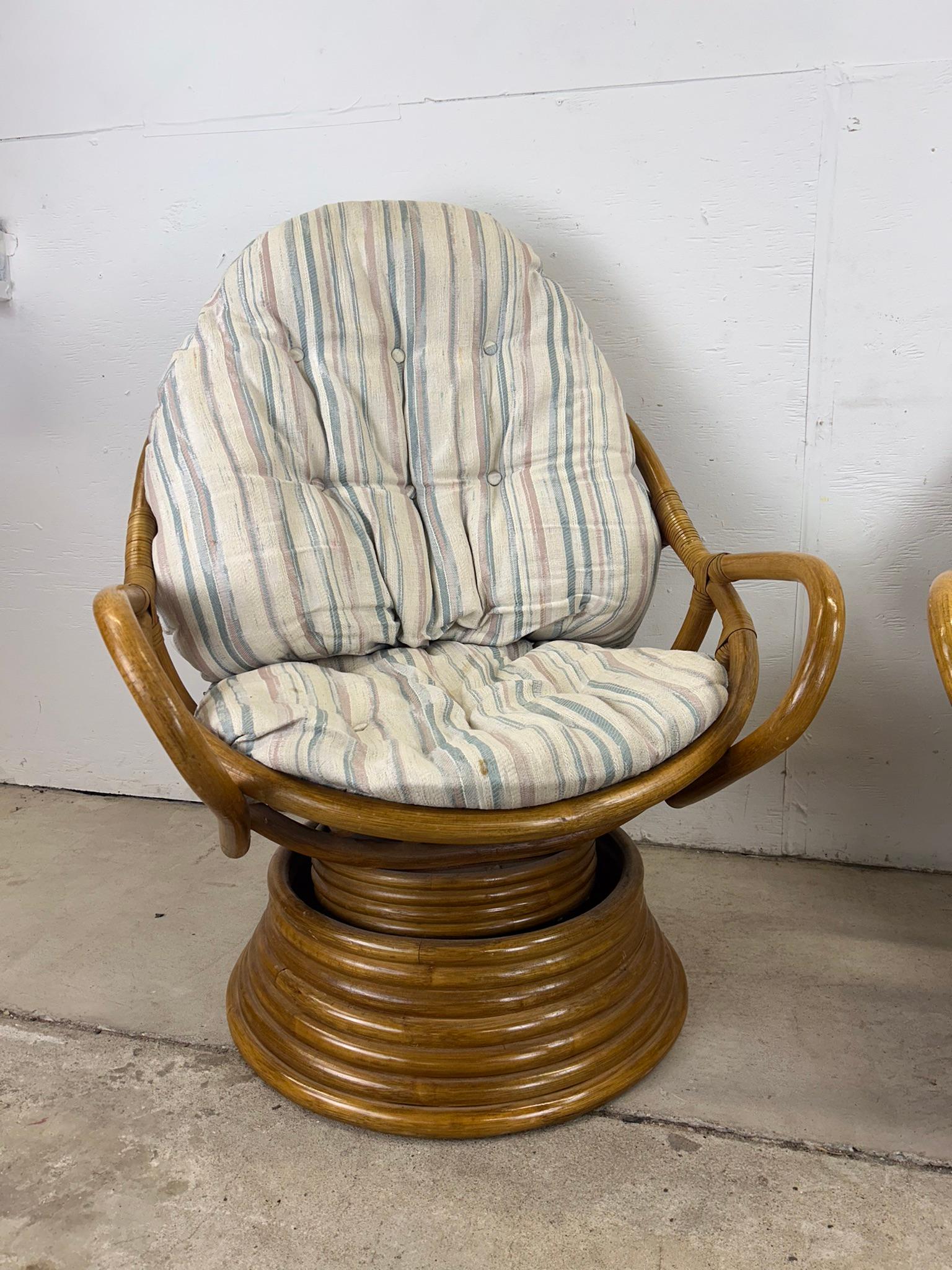 Bohemian Set of 4 vintage rattan accent chairs with swivel base For Sale