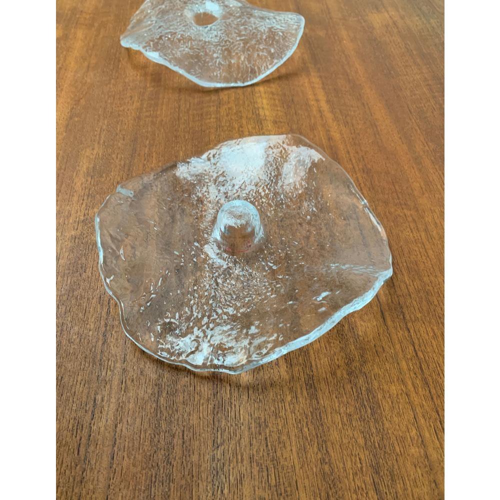 Vintage Swedish Glass Candleholders by Uno Westerberg for Pukeberg, Set of 4, in Very Good conditions. Designed 1960 to 1969 have official proof of authenticity such as vintage catalogs, designer records, or other literature sources.

Additional