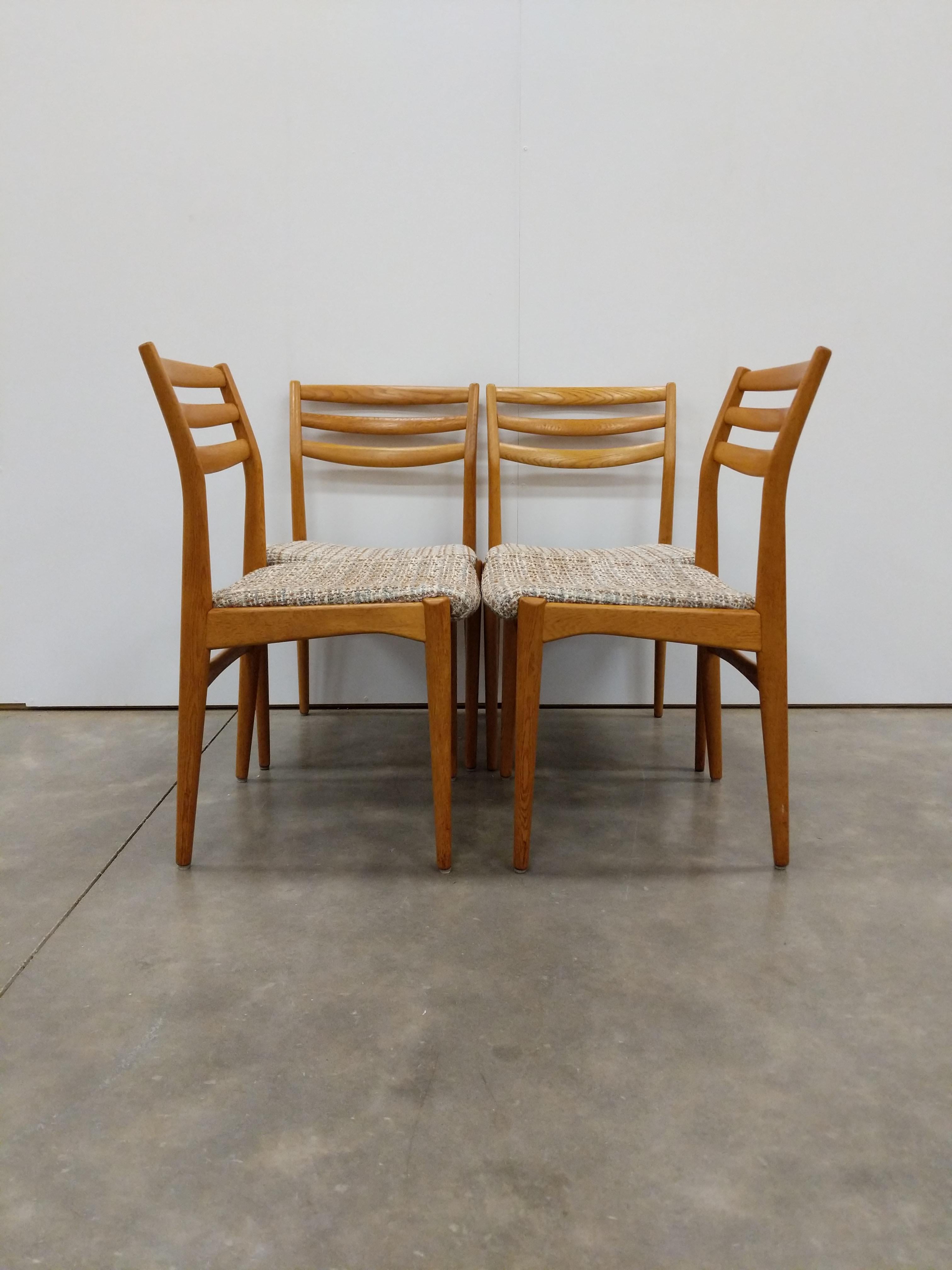 Set of 4 authentic vintage mid century Swedish / Scandinavian Modern dining chairs.

By Nordiska Kompaniet.

Maker's label on bottoms.

Stamped October 17 1960 on bottoms.

This set is in excellent condition with brand new upholstery (see