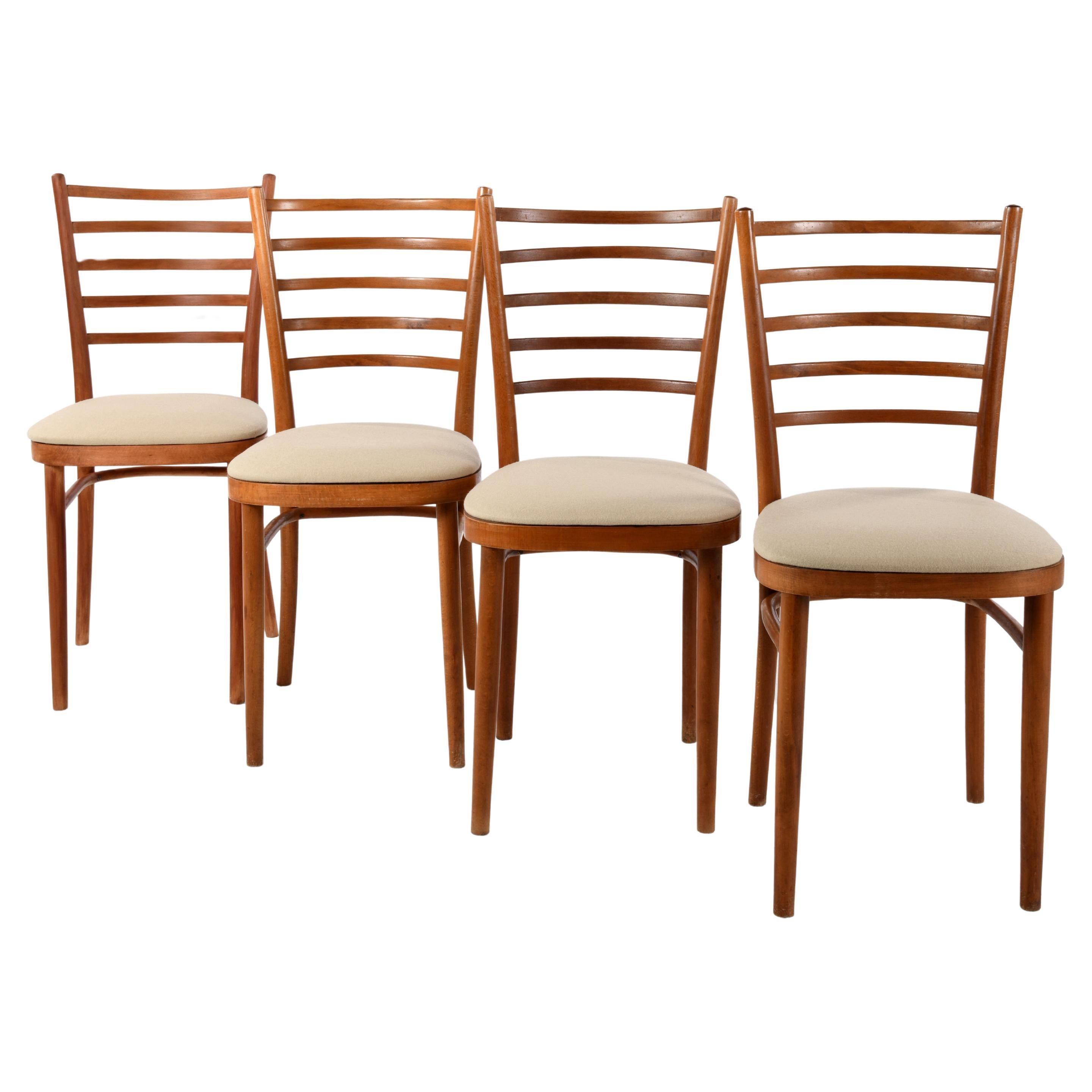 Set of 4 vintage Thonet chairs from the 1920/40s restored with a woollen cloth