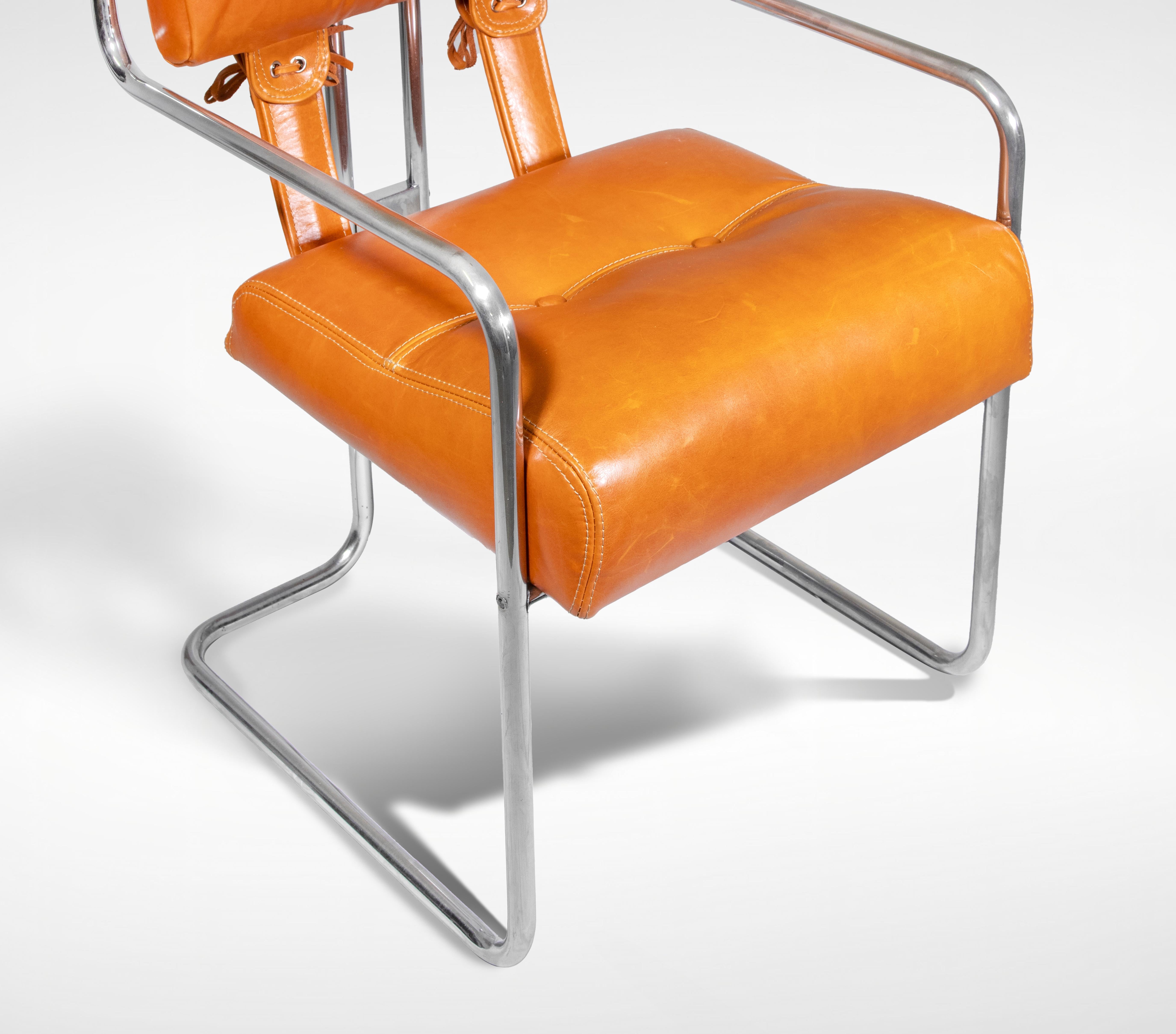 Tucroma Chairs is a design item realized by Guido Faleschini for Mariani, 1970s.

Leather and chromed metal.

Label of Mariani

Don't miss this icon design!
