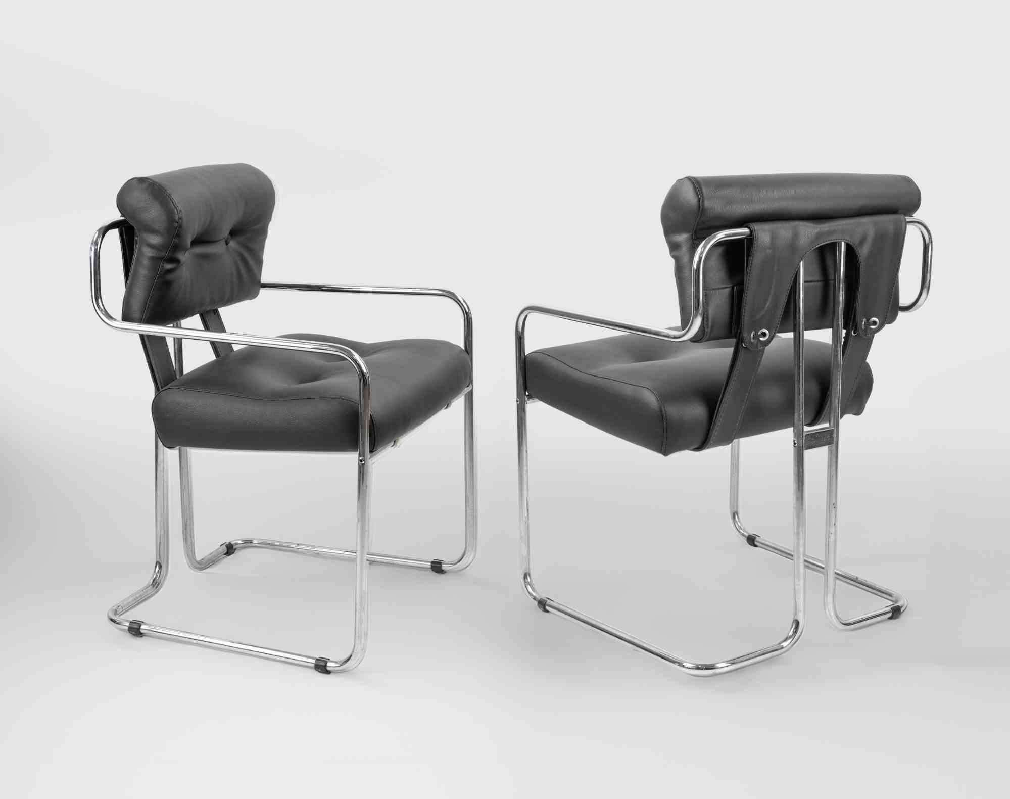 Set of 4 vintage black leather chairs by Guido Faleschini for I4 Mariani, Italy 1970s.
Chromed tubular steel.

Rare and in excellent condition.