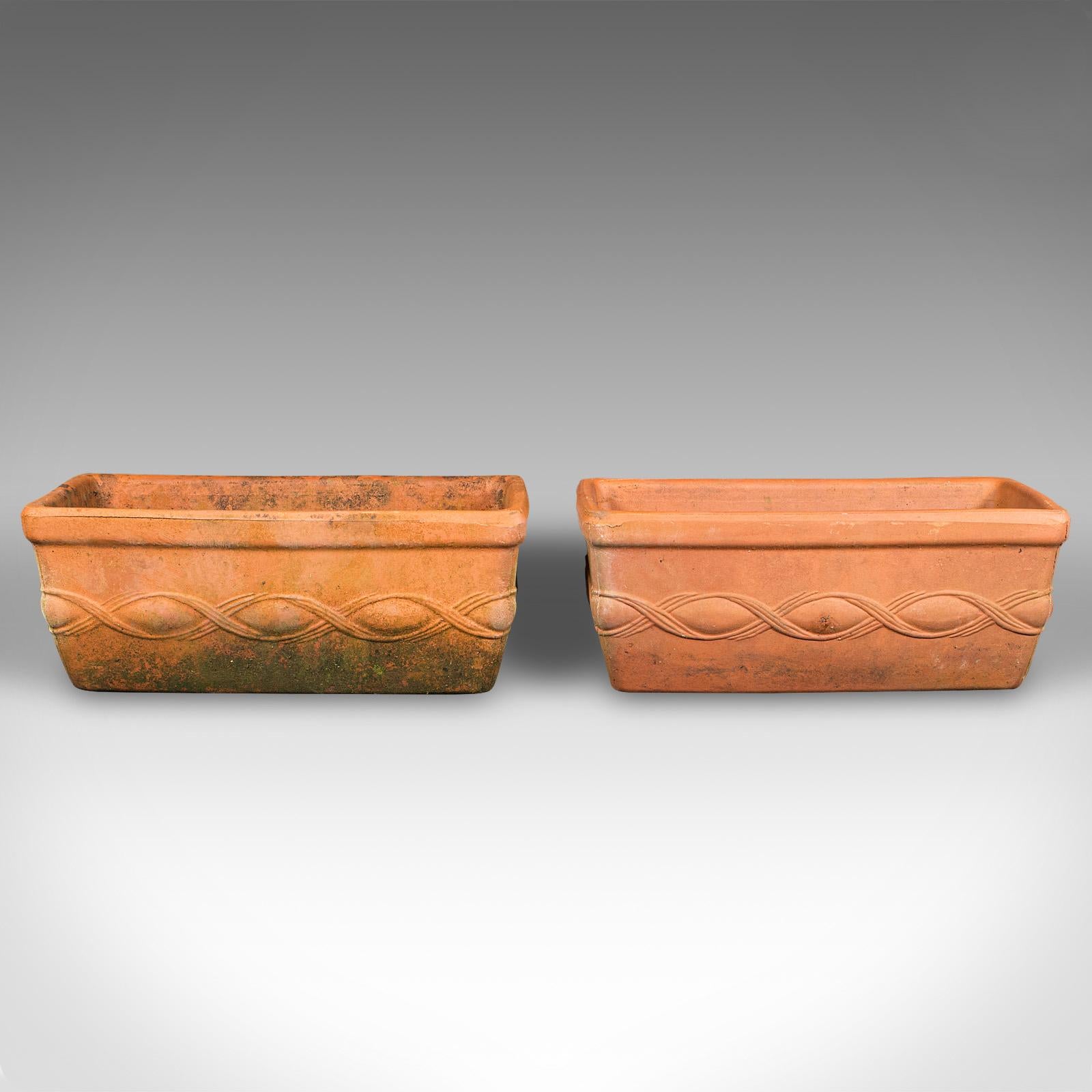 This is a set of 4 vintage windowsill planters. An Italian, terracotta window box jardiniere, dating to the late 20th century, circa 1970.

Charmingly petite windowsill planters, ideal for a chic apartment or townhouse
Displaying a desirable aged