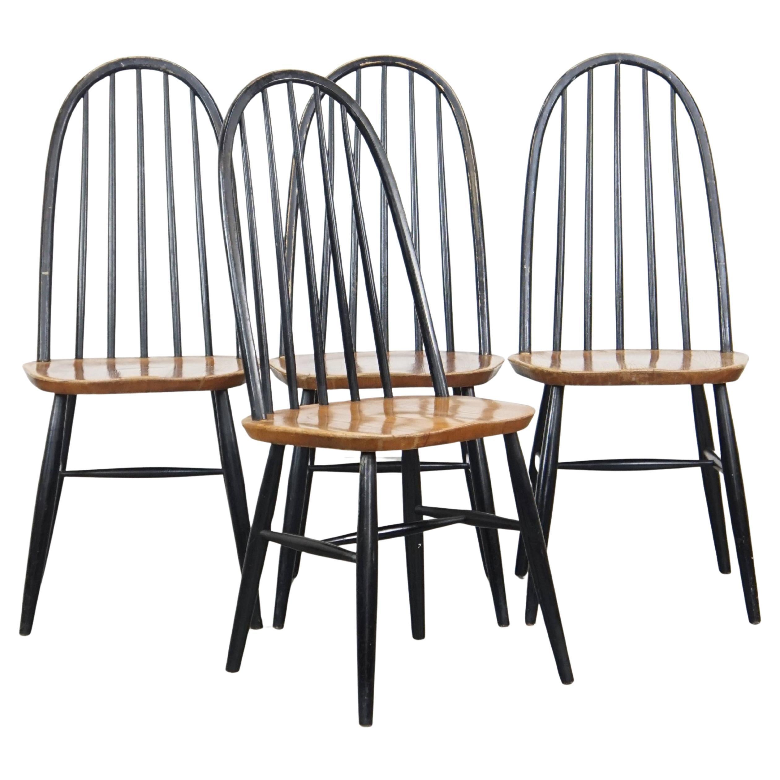 Set of 4 vintage wooden design chairs with black spindle backrest and brown seat