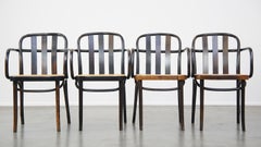 Set of 4 vintage wooden design dining/bistro chairs with woven seats