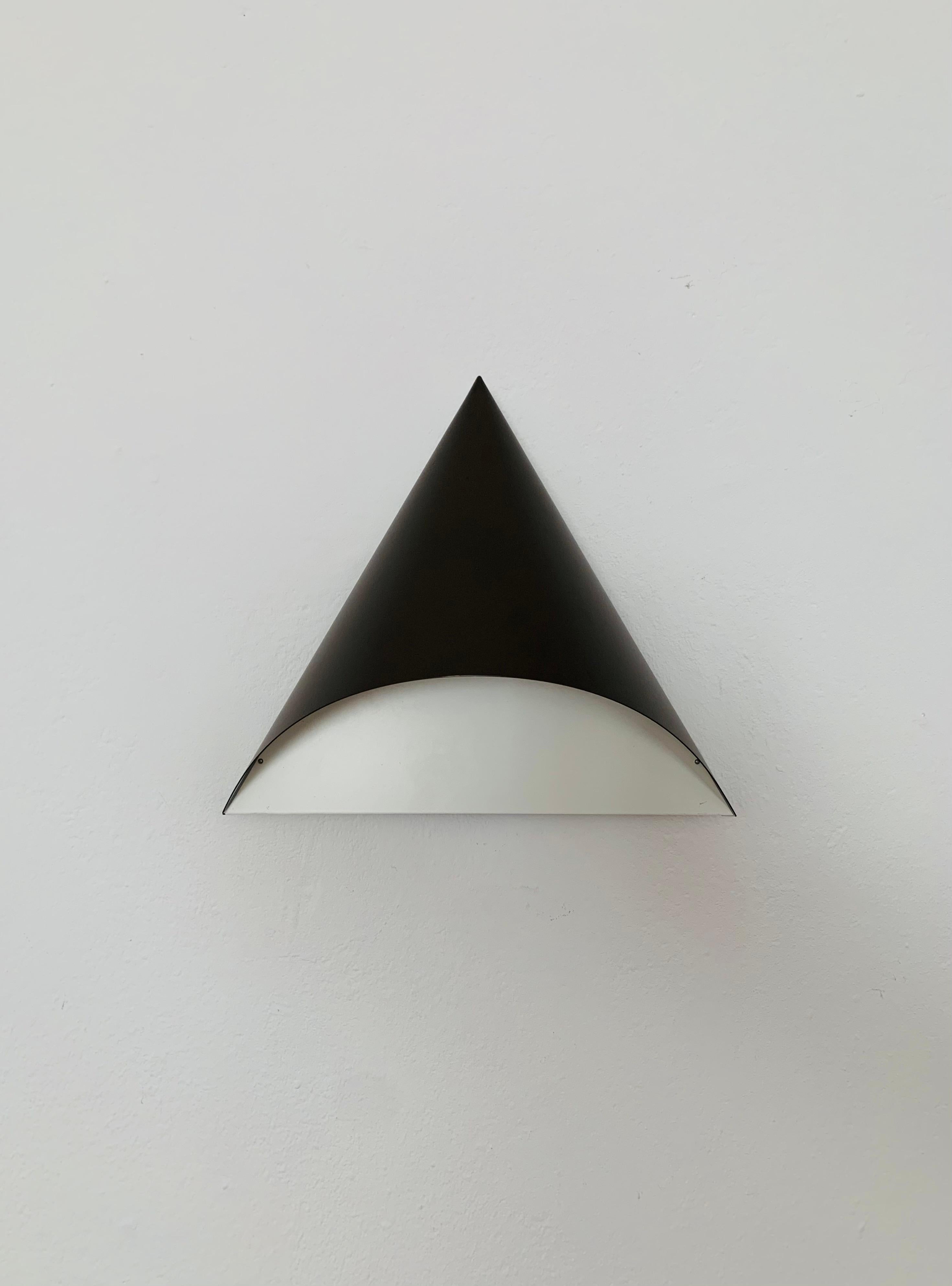 Fantastic wall lamps from the 1970s.
The Staff brand is known for its high-quality workmanship.
A warm light emerges.

Design: R. Krüger and D. Witte
Manufacturer: Staff

The color outside is dark brown.

The pictures are part of the