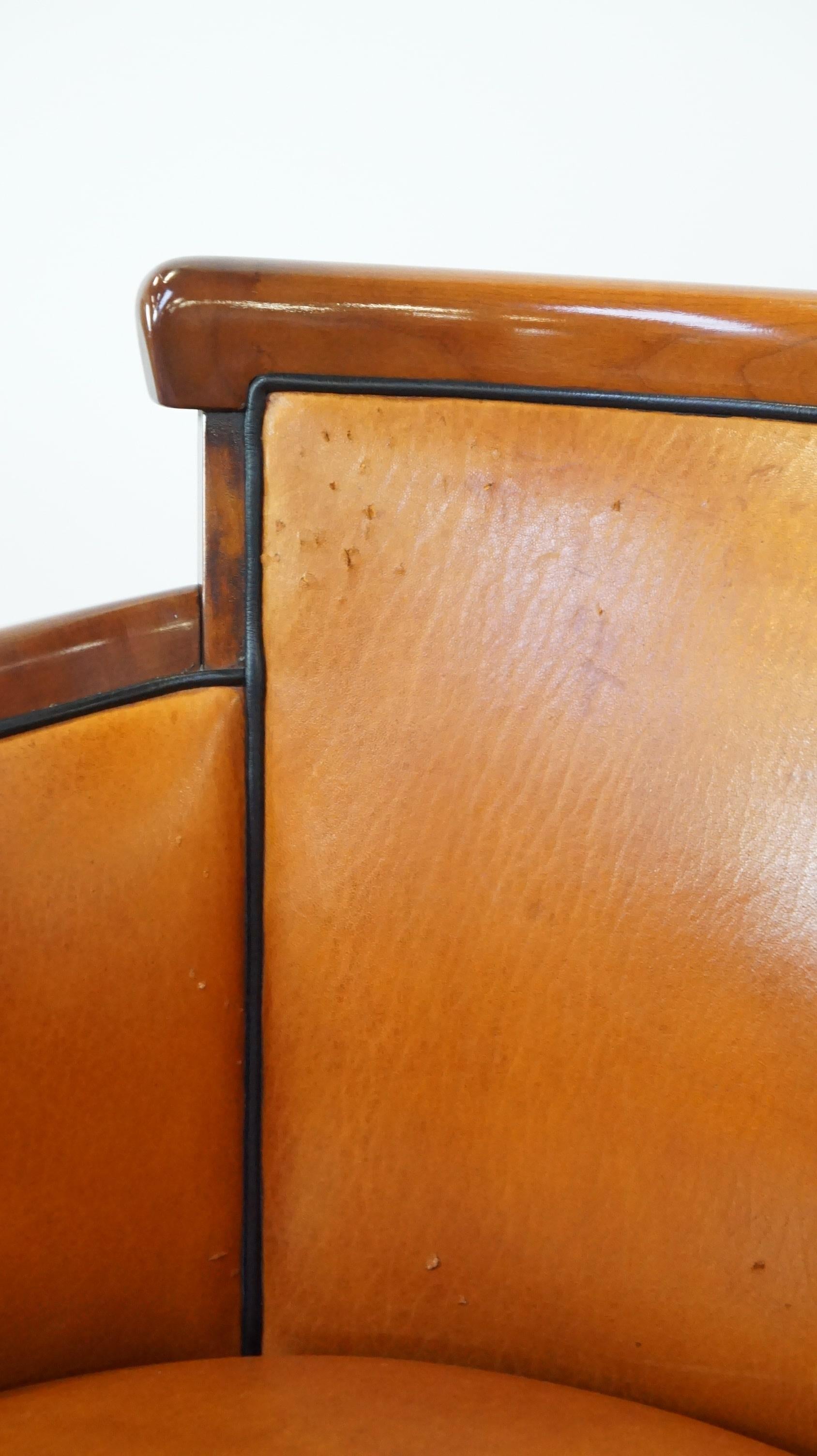 Conjunto de 4 cálidas sillas de comedor de piel de oveja combinadas con madera 12