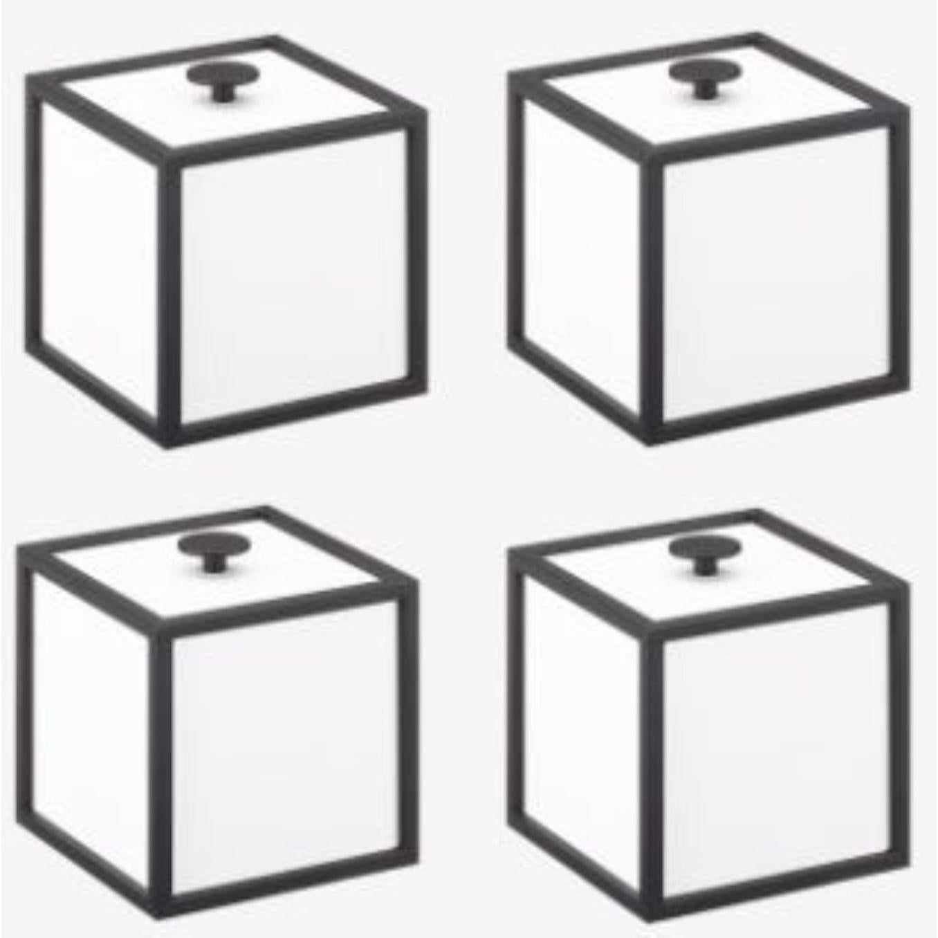 Set of 4 white frame 10 box by Lassen
Dimensions: d 10 x w 10 x h 10 cm 
Materials: Finér, Melamin, Melamine, Metal, Veneer
Weight: 0.85 Kg

Frame box is a square box in a cubistic shape. The simple boxes are inspired by the Kubus candleholder
