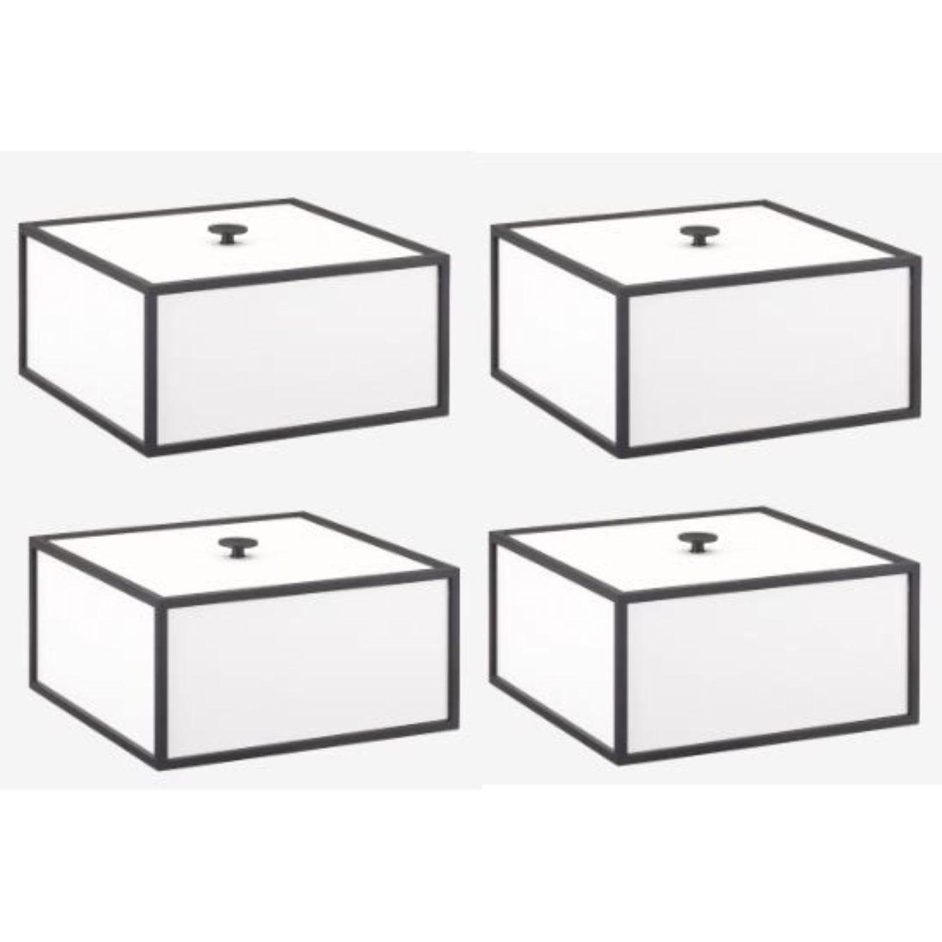 Set of 4 white frame 20 box by Lassen
Dimensions: d 20 x w 20 x h 10 cm 
Materials: Melamin, Melamine, Metal, Veneer
Weight: 2.00 Kg

Frame box is a square box in a cubistic shape. The simple boxes are inspired by the Kubus candleholder by