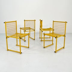 Ensemble de 4 chaises en métal jaune fil de fer, années 1980